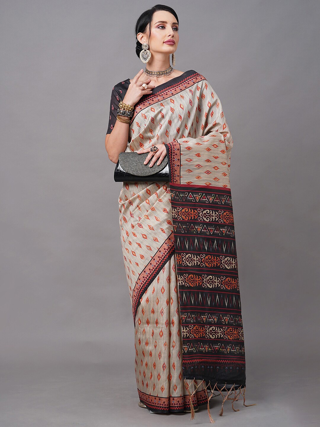 

Mitera Green & Black Ethnic Motifs Art Silk Ikat Saree