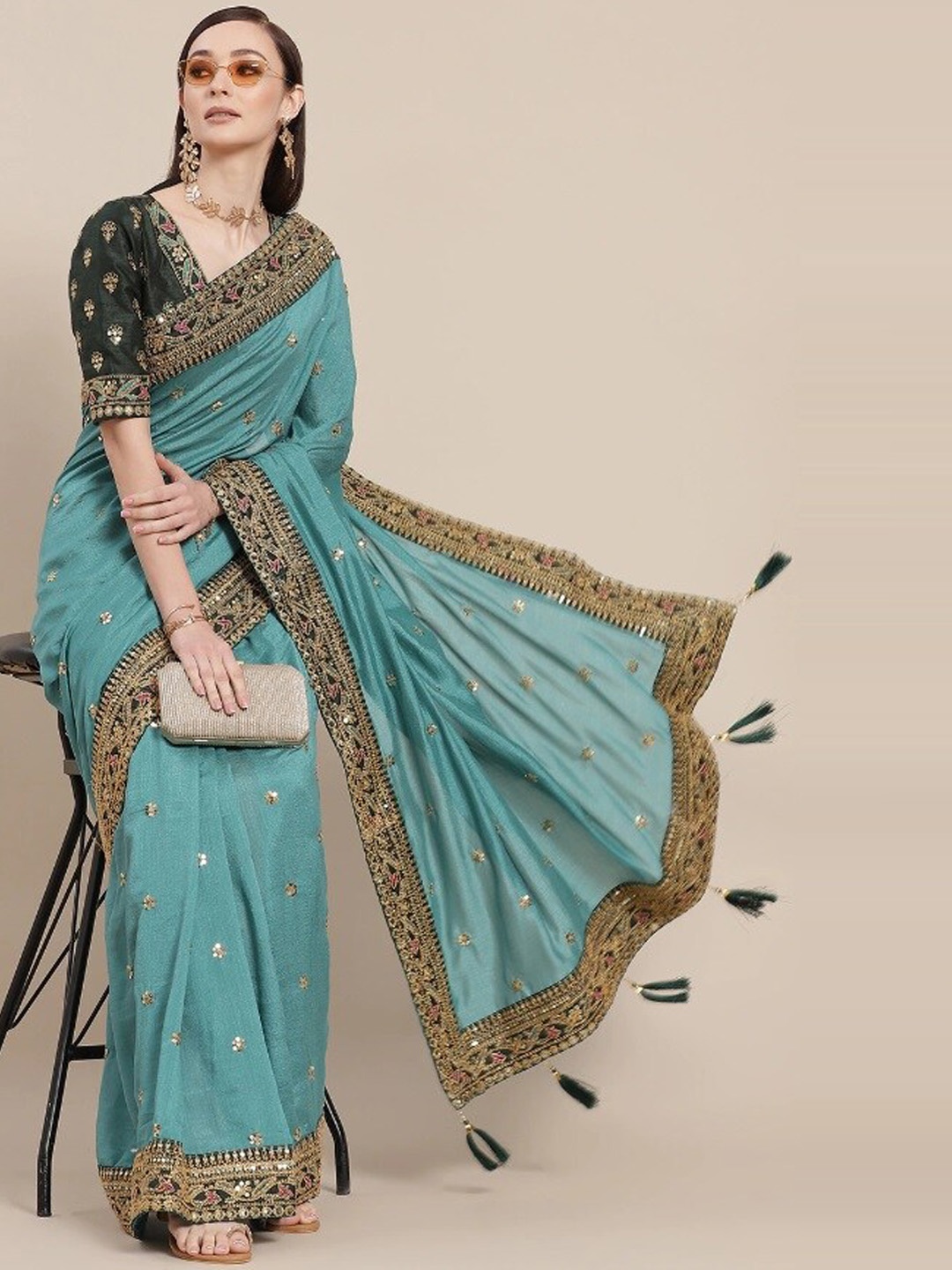 

Ethnic Yard Blue Embroidered Georgette Saree