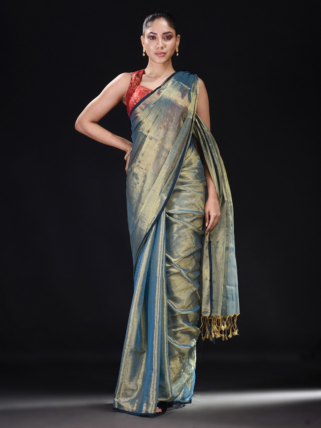 

BEATITUDE Green Ethnic Motifs Zari Tissue Saree