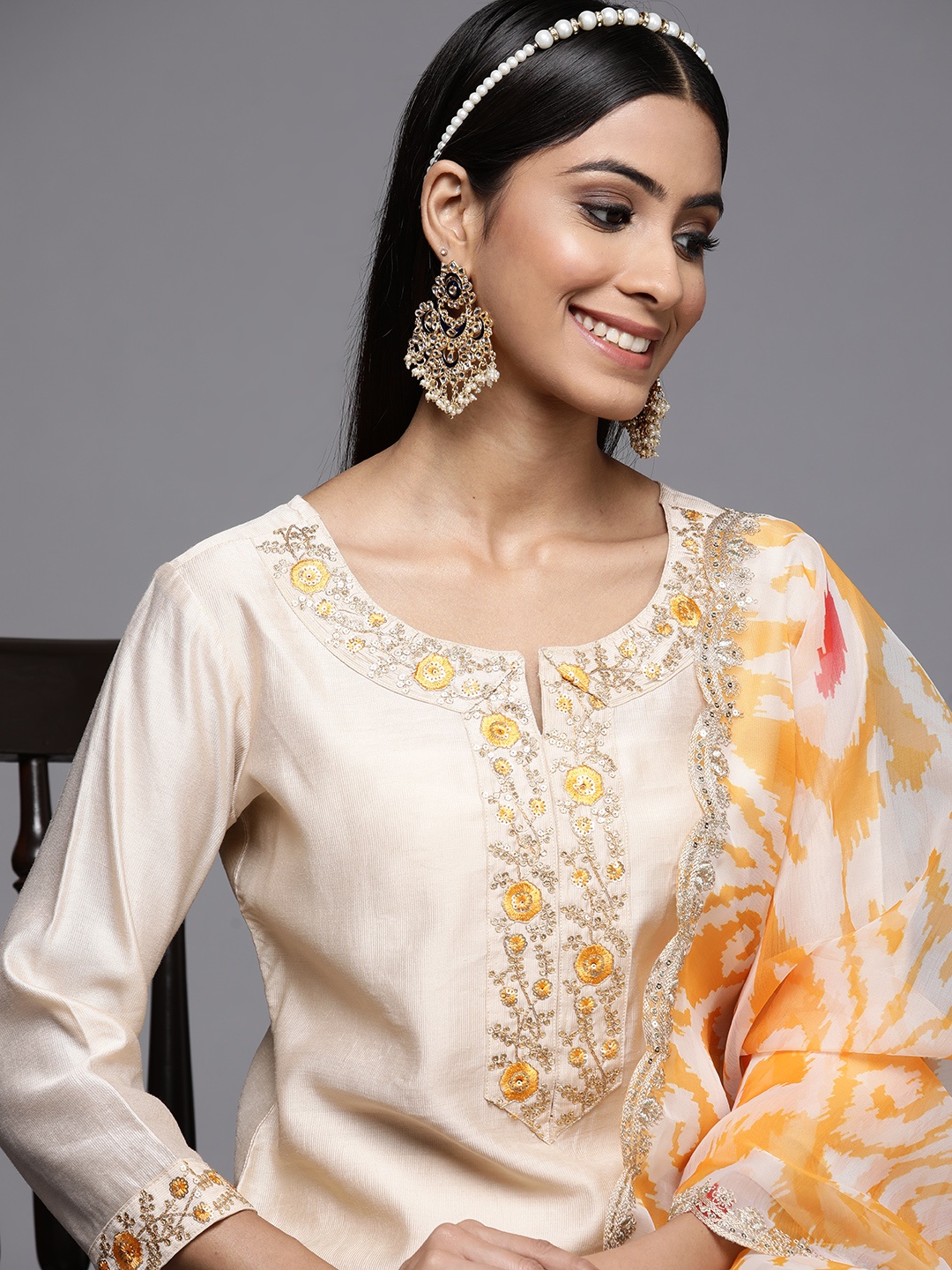 

Indo Era Women Cream-Coloured Ethnic Motifs Embroidered Sequinned Liva Kurta with Trousers & With Dupatta