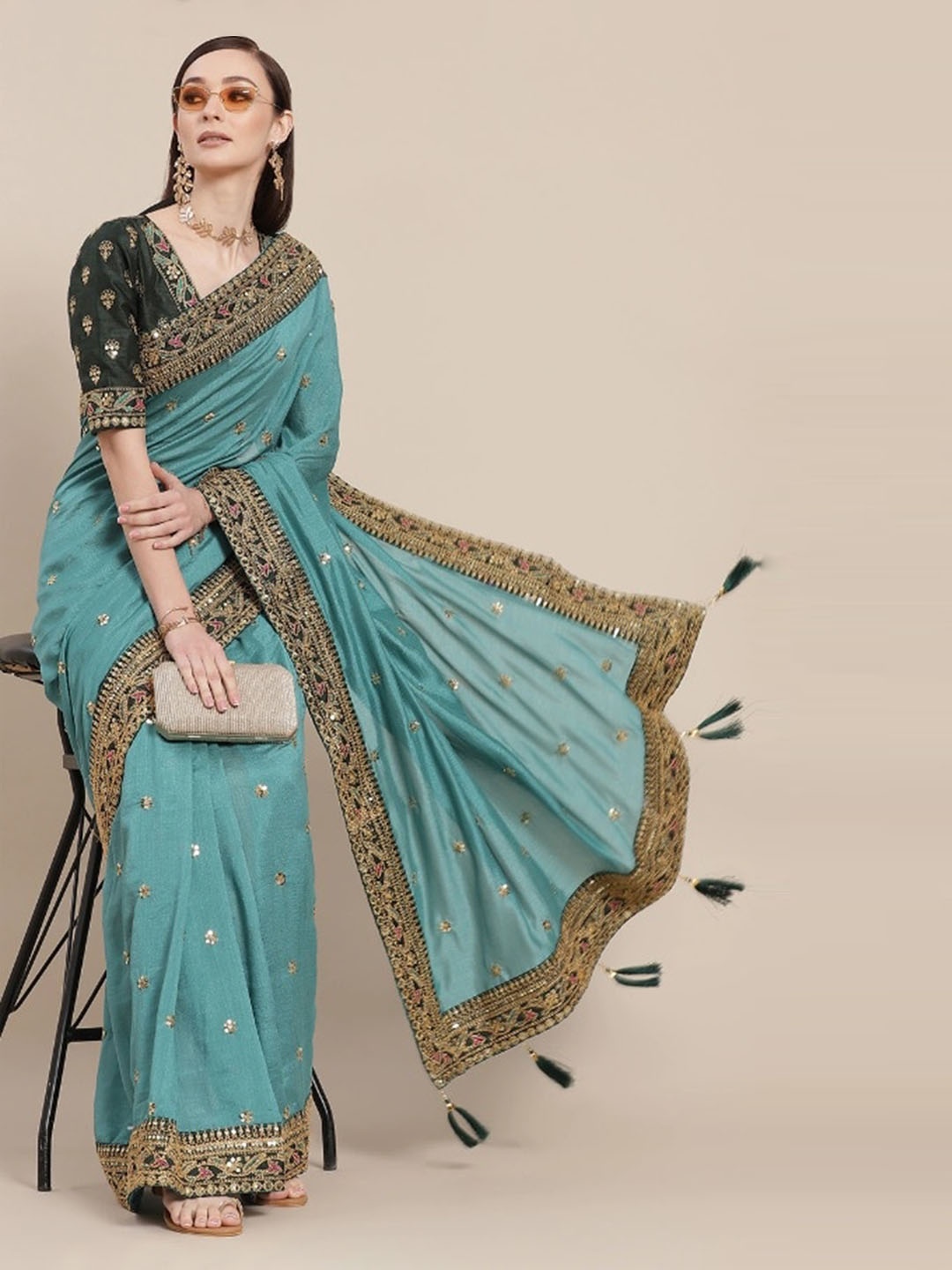 

Fashion Basket Blue & Green Ethnic Motifs Embroidered Pure Georgette Saree