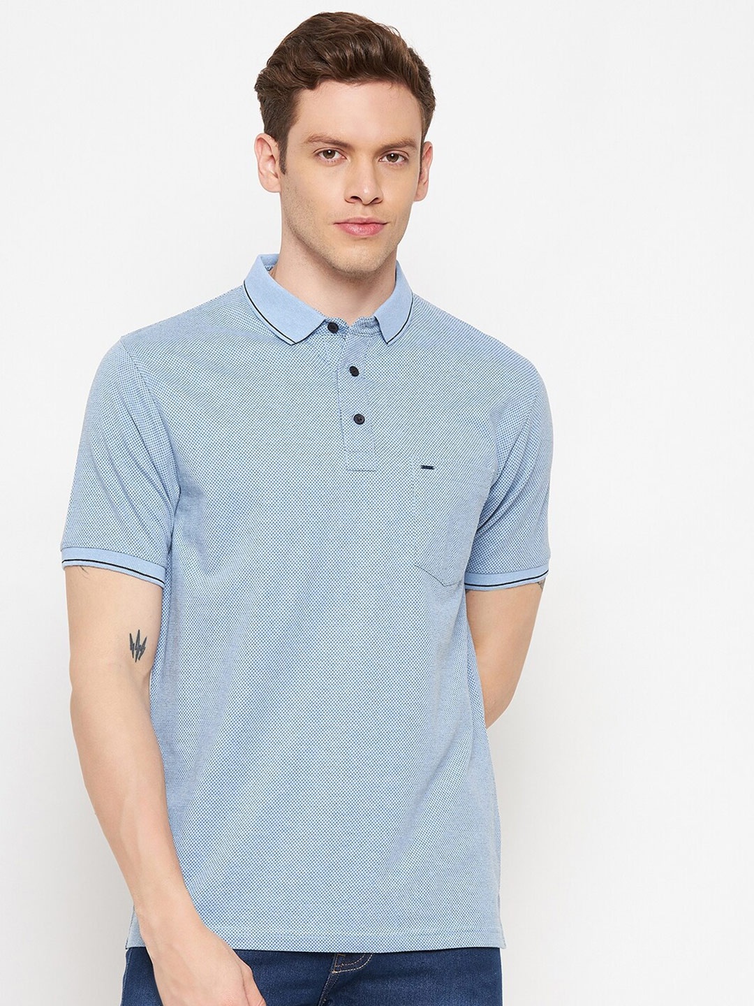 

Okane Men Blue Self Design Polo Collar T-shirt