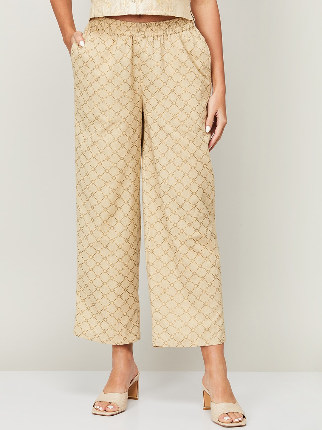 

Melange by Lifestyle Women Beige Ethnic Motifs Printed Trousers