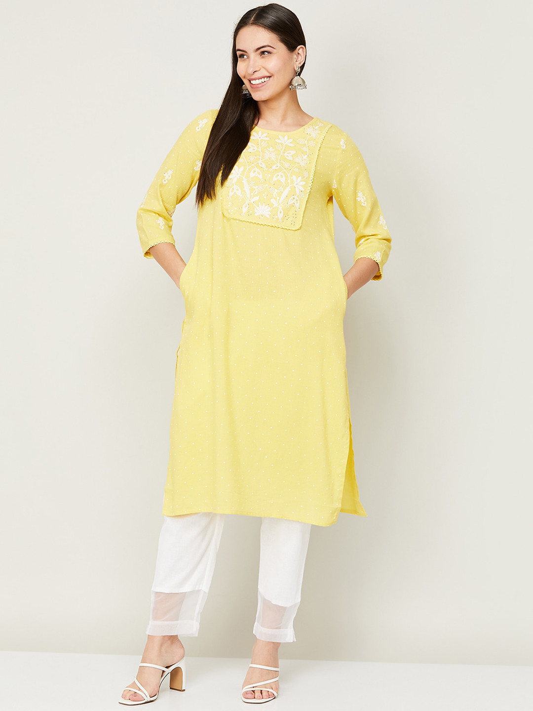 

Melange by Lifestyle Women Yellow Ethnic Motifs Embroidered Thread Work Pure Cotton Kurti with Trousers