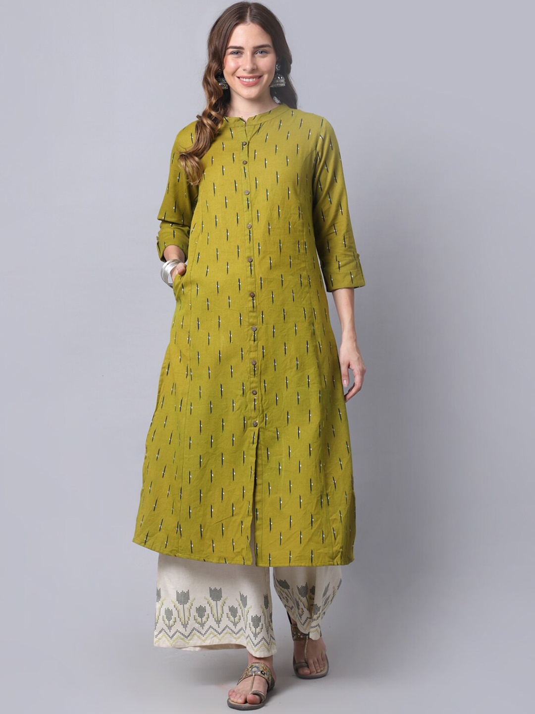 

Pistaa Women Green Printed Kurta with Palazzo