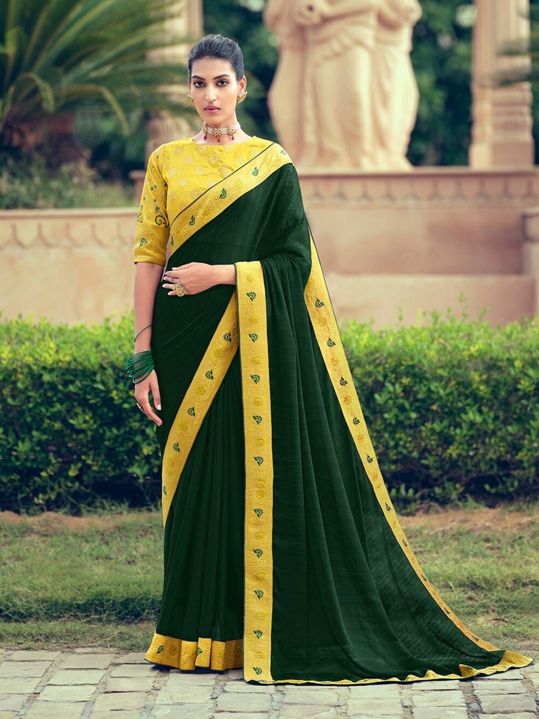 

Shaily Green & Gold-Toned Striped Zari Pure Chiffon Saree
