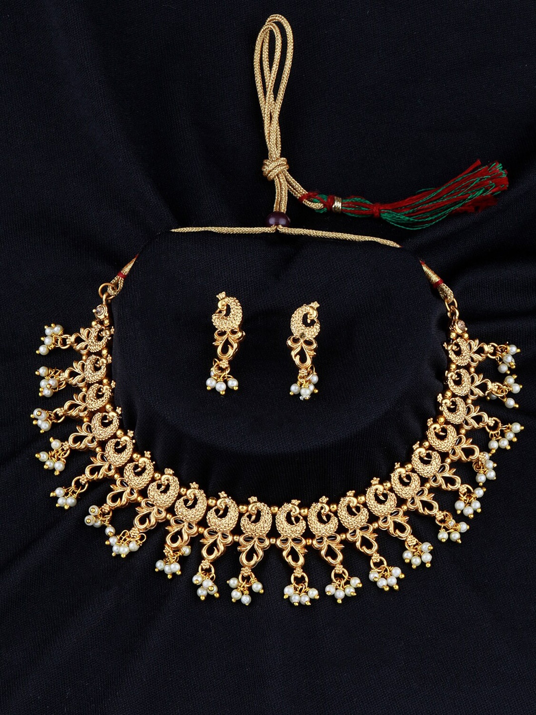 

Silver Shine Gold-Plated White Kundan-Studded & Peal Beaded Jewellery Set