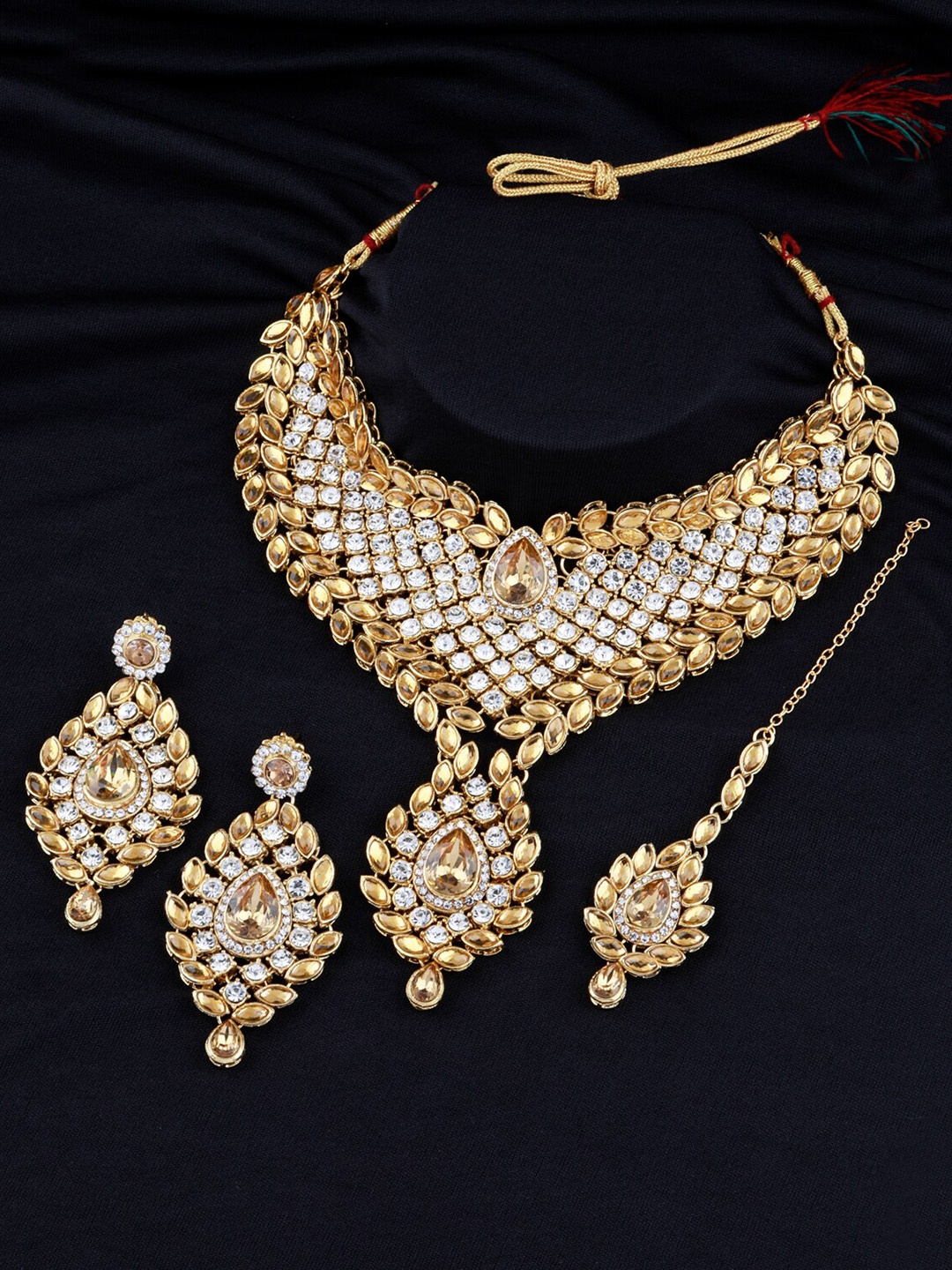 

Silver Shine Gold-Plated White Kundan-Studded & Peal Beaded Jewellery Set