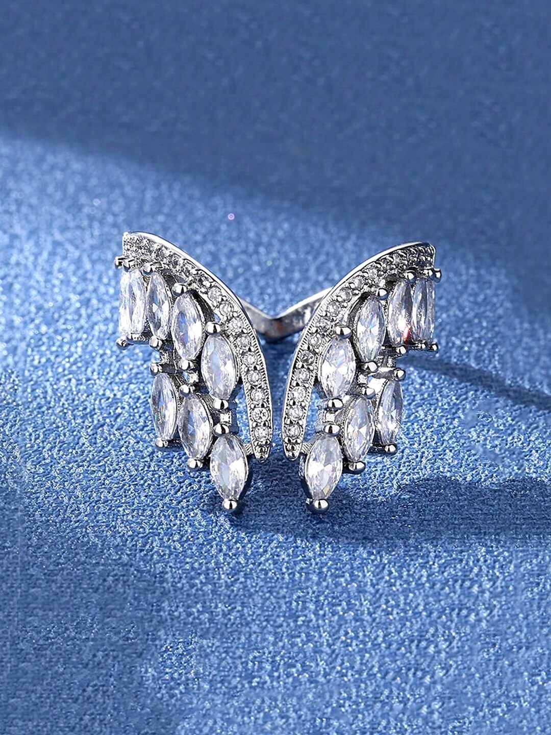 

Yellow Chimes Silver-Plated & White Crystal-Studded Wings Shaped Finger Ring