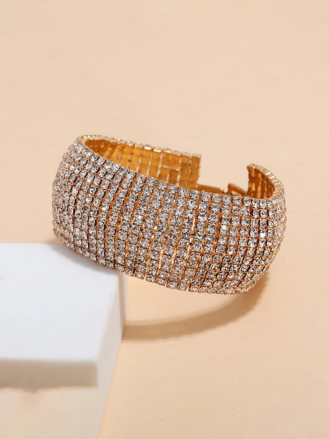 

Yellow Chimes Women Rose Gold-Plated Crystals & Stone Studded Charm Bracelet