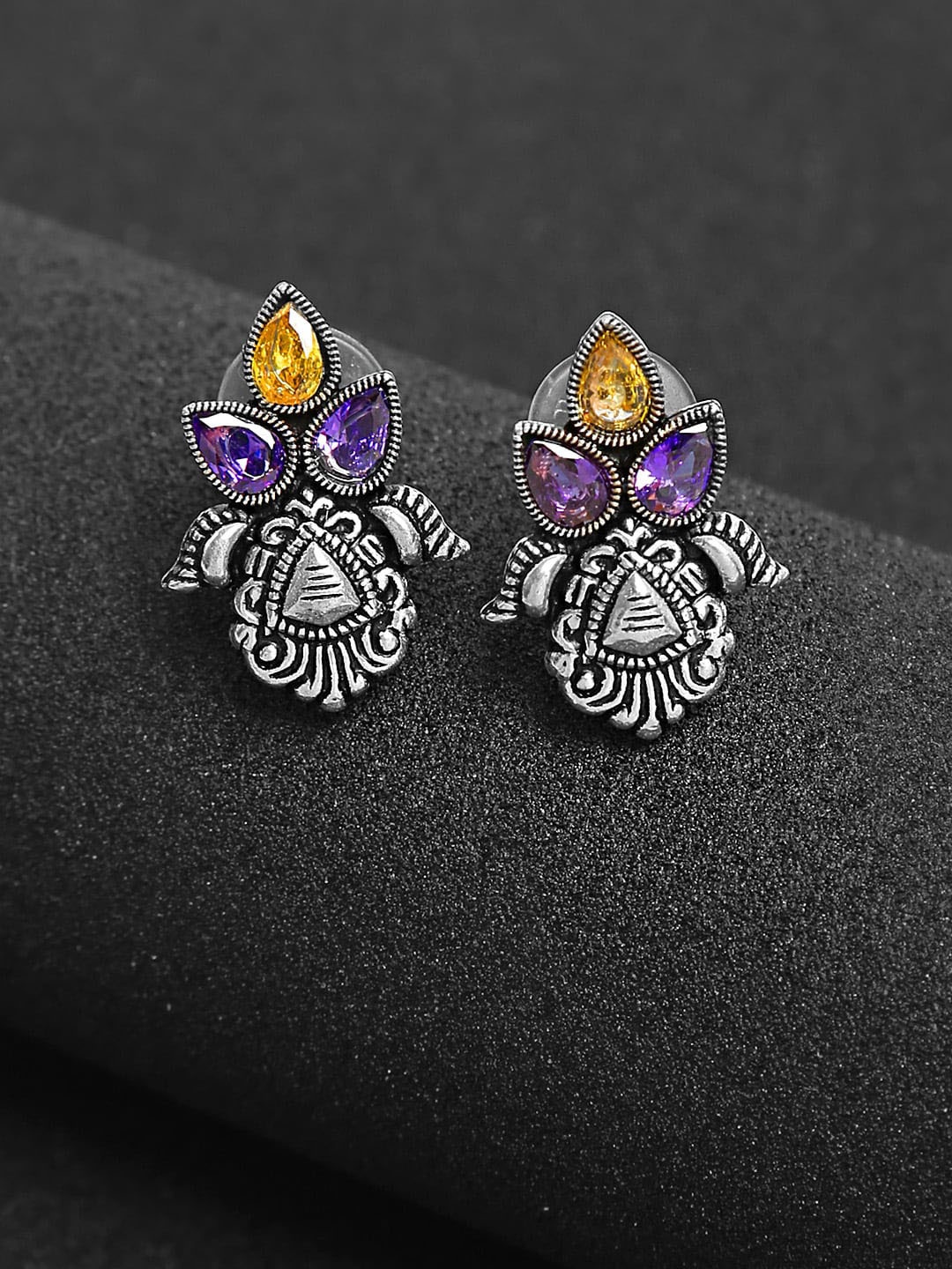 

Yellow Chimes Silver Pleated Contemporary Studs Earrings