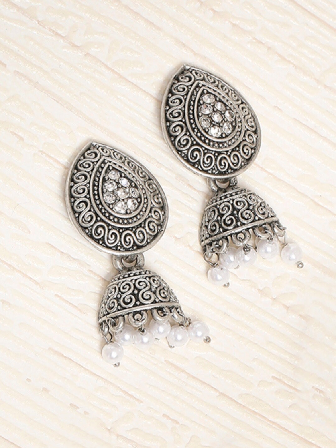 

OOMPH Silver-Toned Teardrop Shaped Jhumkas Earrings