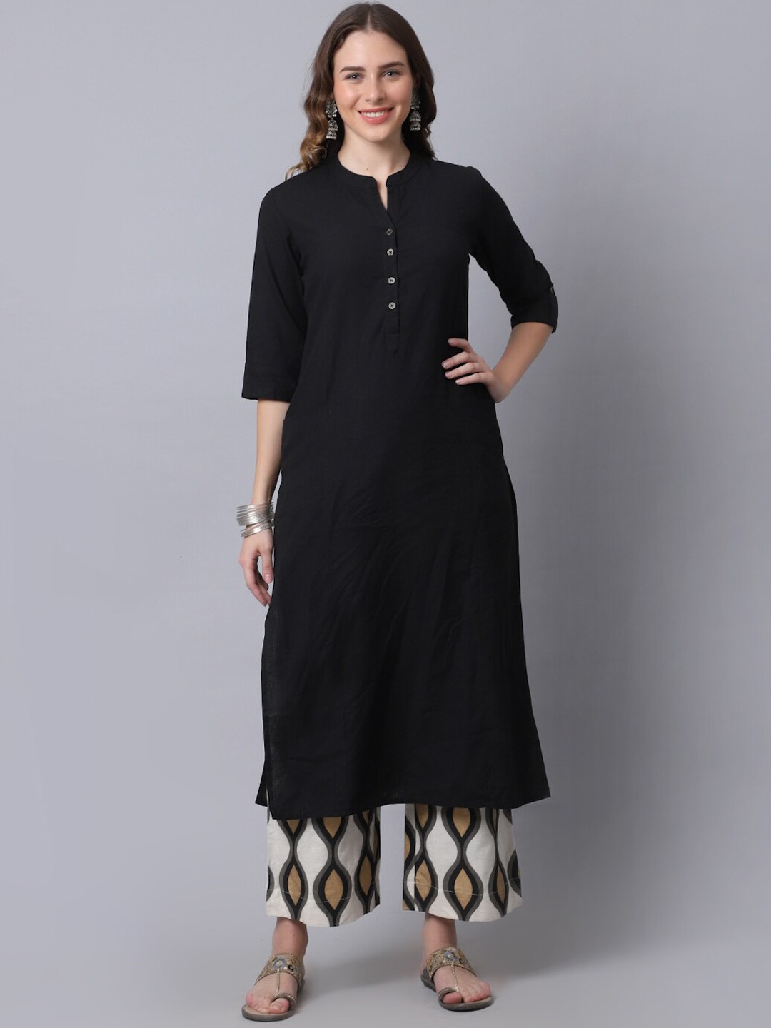 

Pistaa Women Black Printed Layered Kurti with Trousers