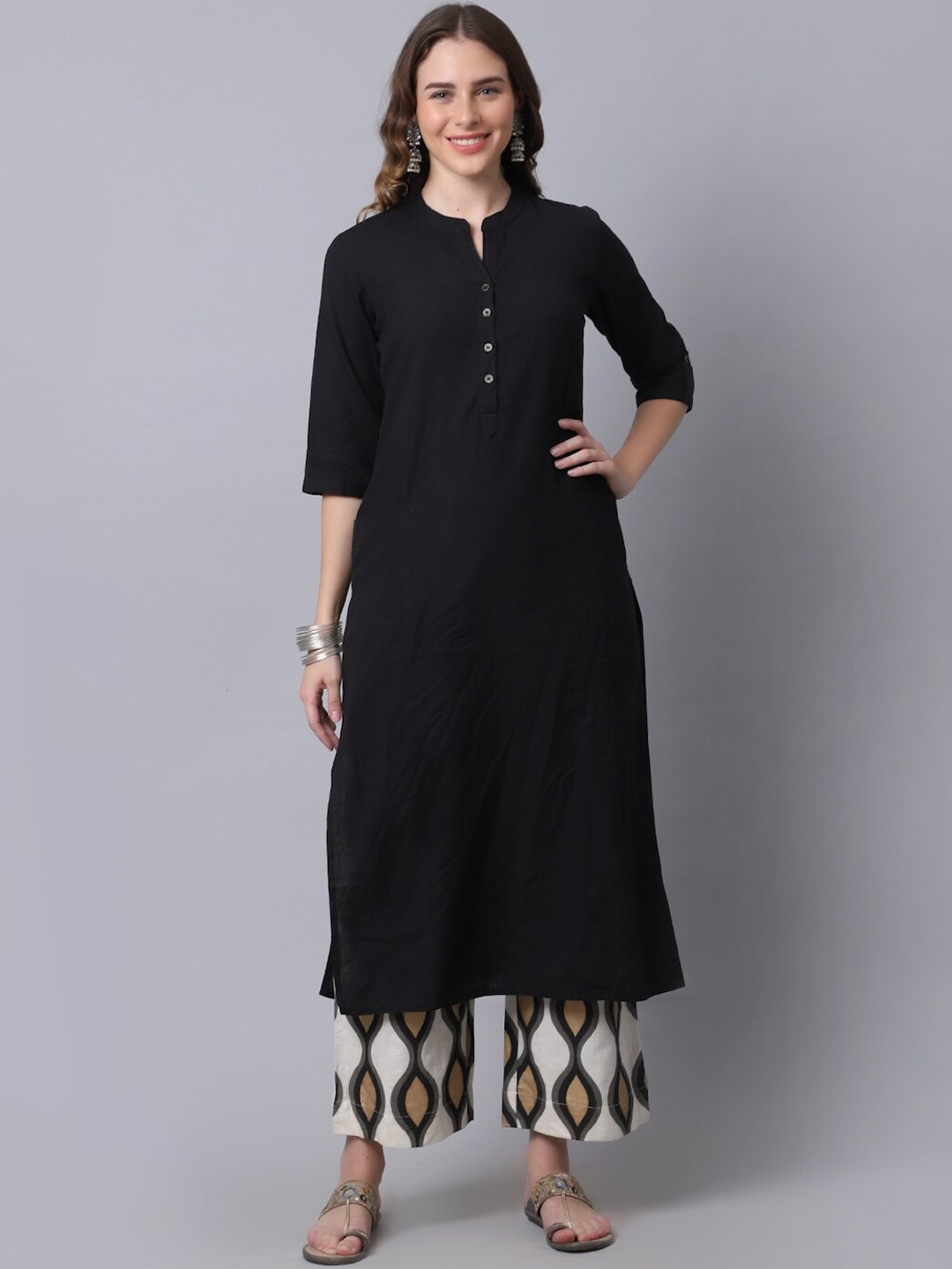 

Pistaa Women Black Printed Kurta with Palazzos