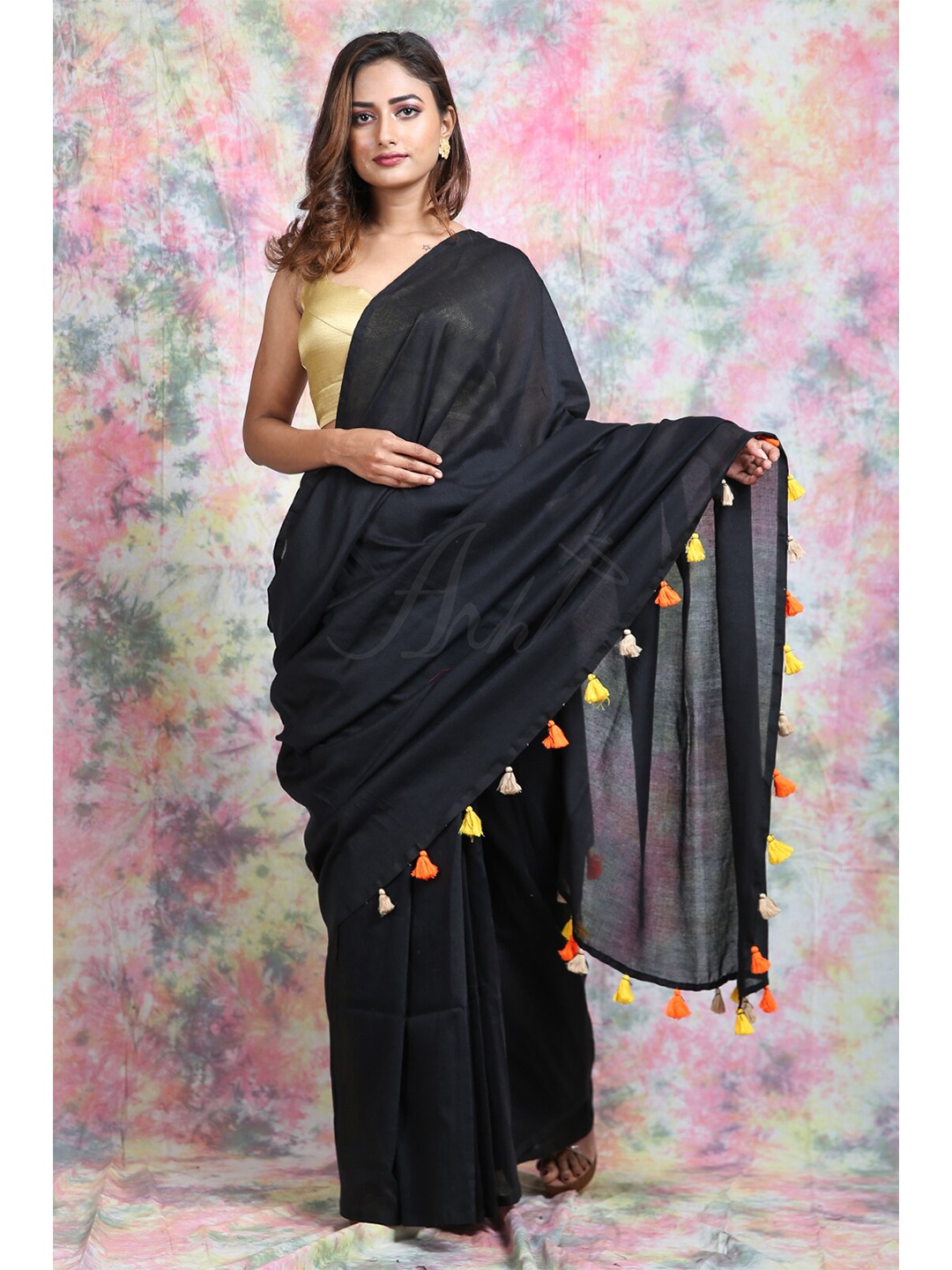 

Charukriti Black & Orange Pure Cotton Saree