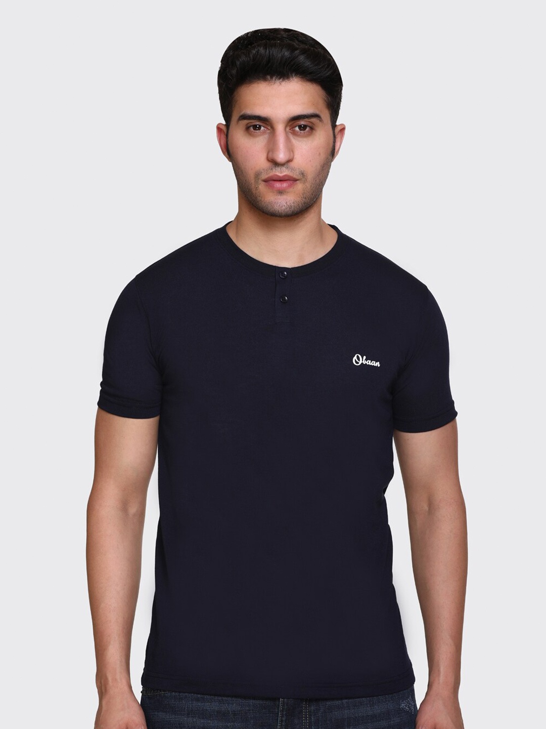

Obaan Men Blue Solid T-shirt