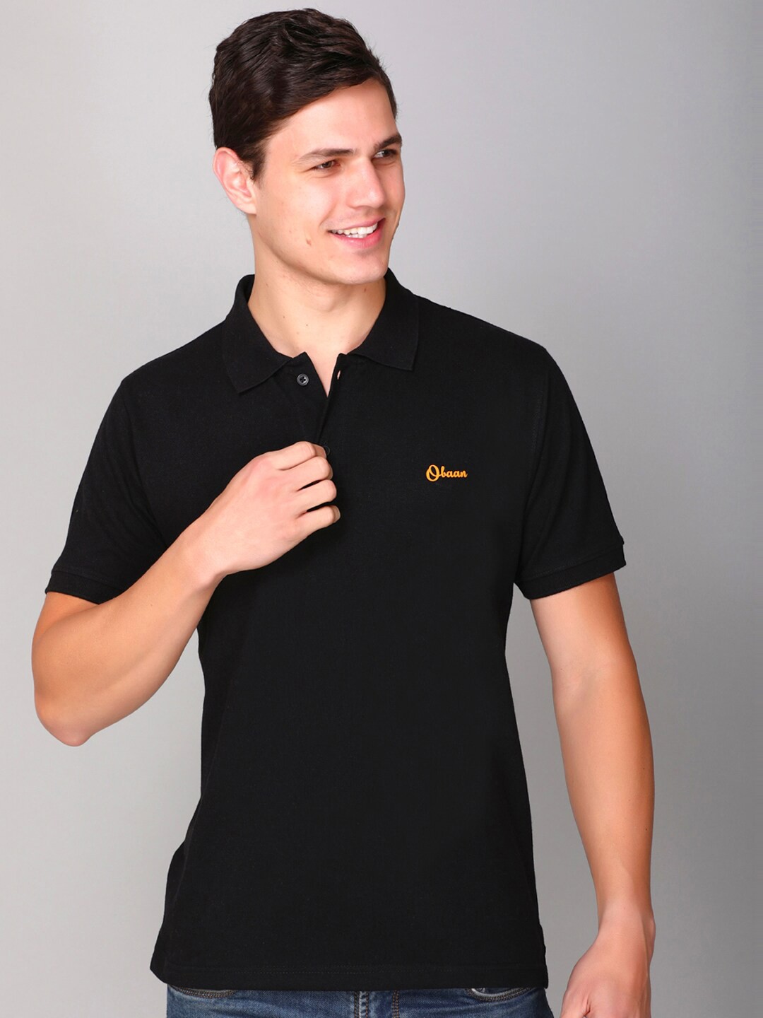 

Obaan Men Black Solid Polo Collar T-shirt