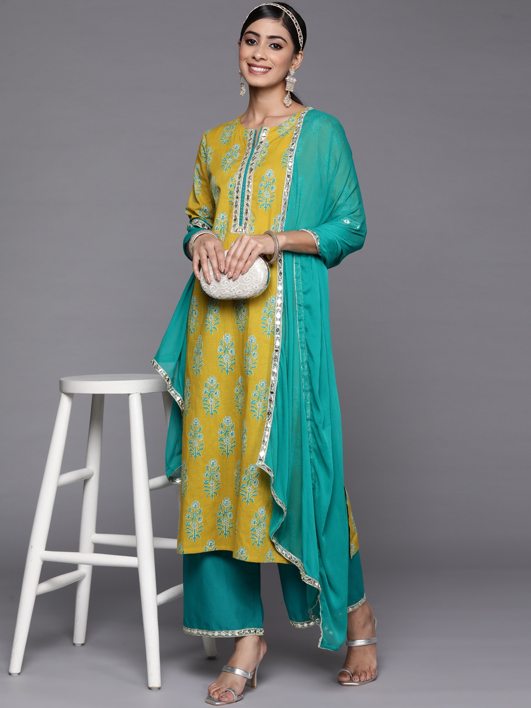 

Indo Era Women Yellow Floral Printed Mirror Work Kurta with Palazzos & With Dupatta