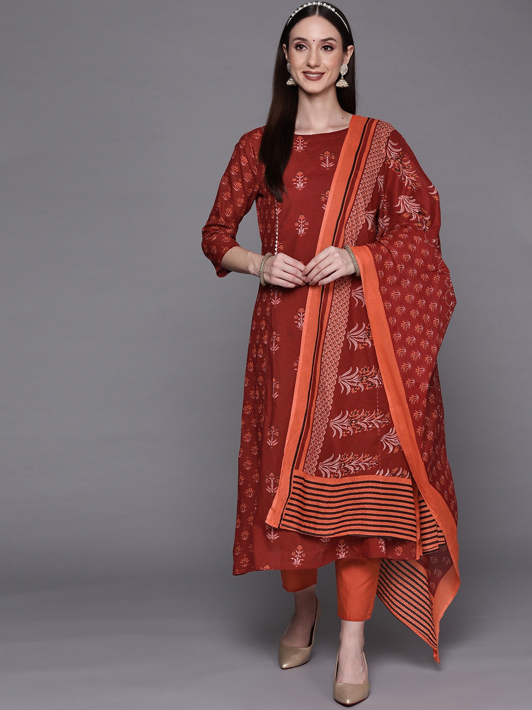 

Indo Era Women Maroon Ethnic Motifs Printed Kurta with Trousers & With Dupatta