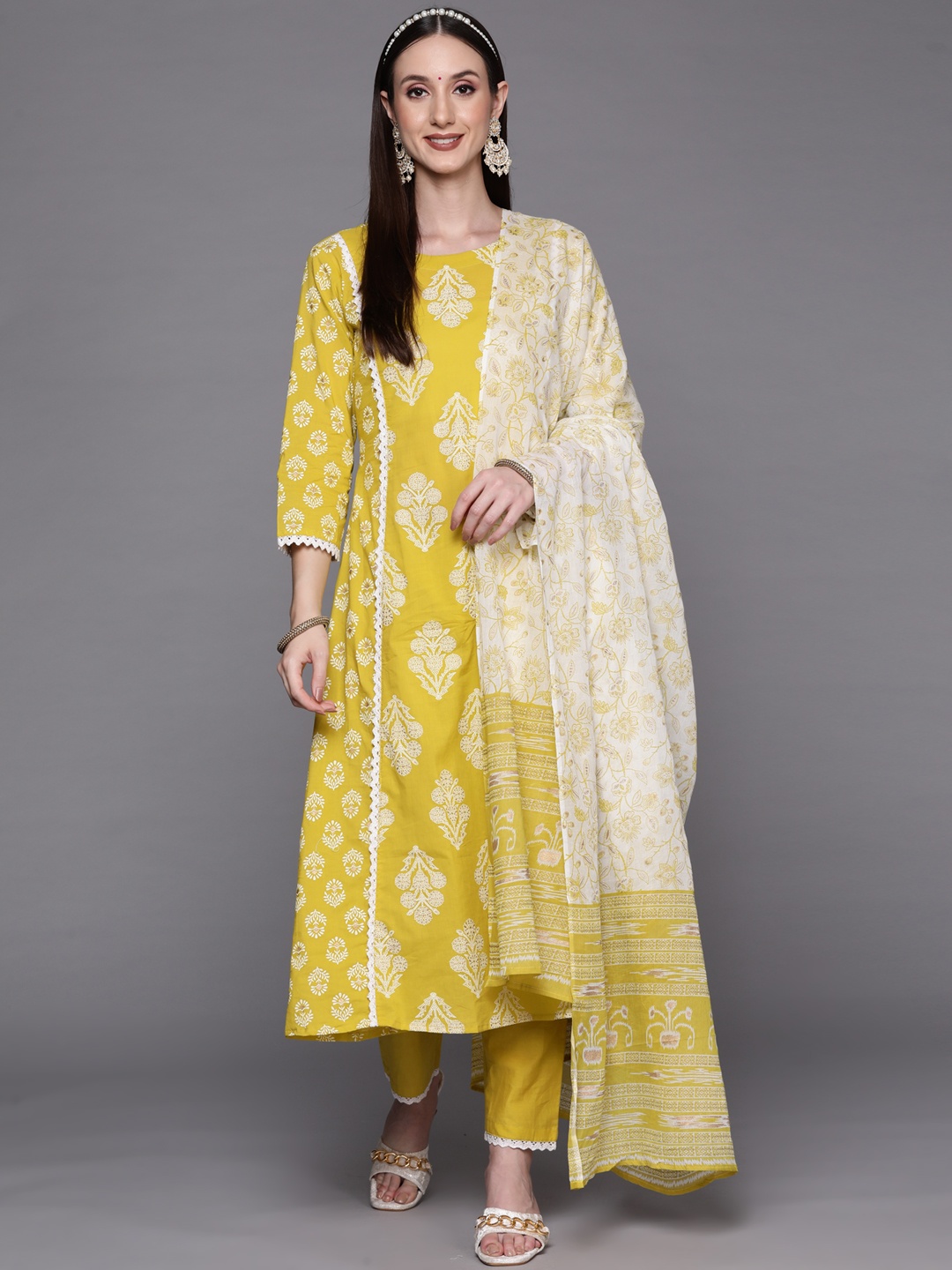 

Indo Era Women Yellow Floral Printed Gotta Patti Kurta with Trousers & With Dupatta