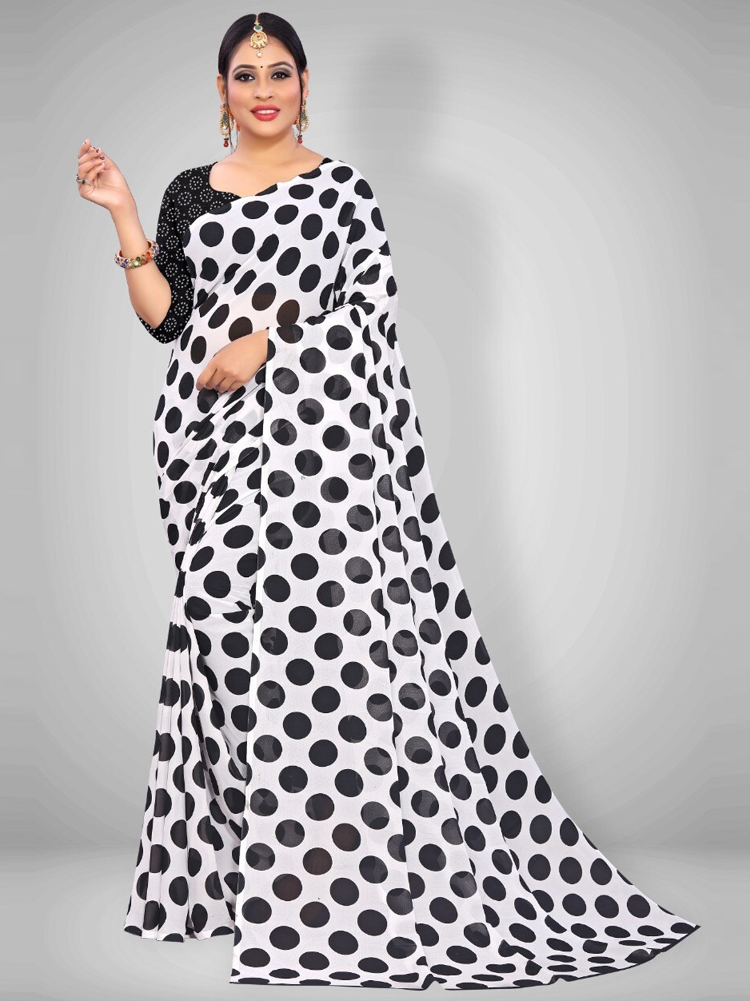 

Abhilasha Black & Off White Pure Georgette Saree With Unstitched Blouse Piece
