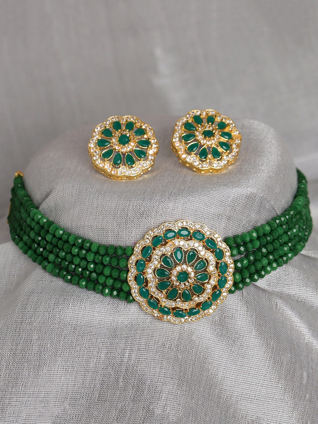 

Sanjog Gold-Plated Jaipur Kundan Green & White Stone Studded & Beaded Jewellery Set
