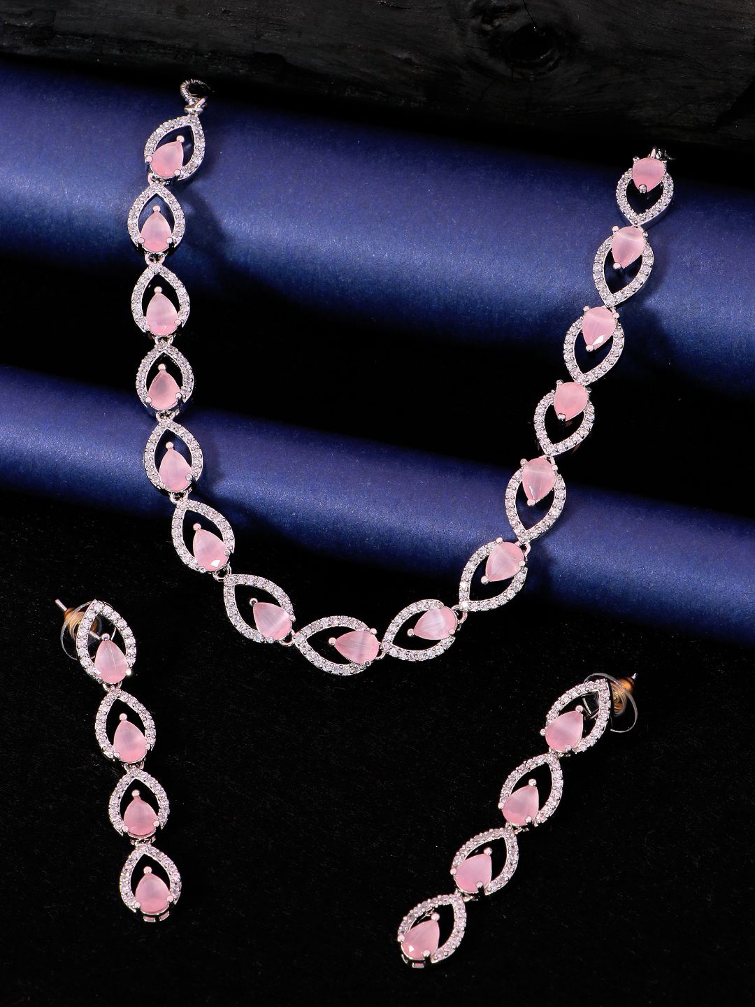 

SwaDev Silver-Plated Pink & White AD Studded Jewellery Set
