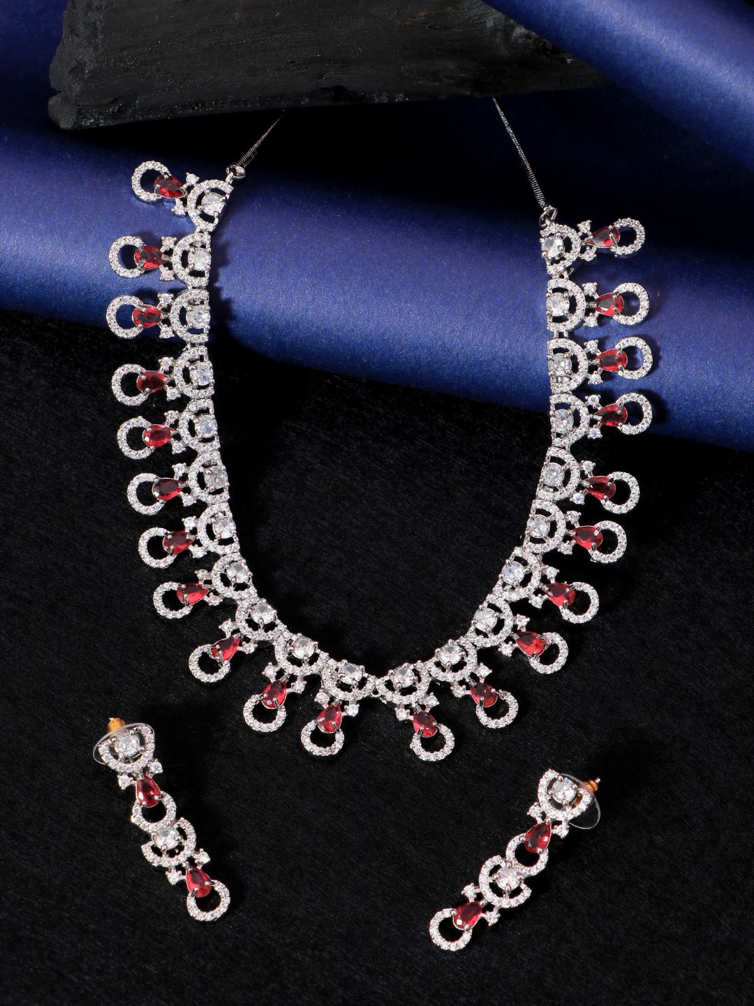 

SwaDev Women Silver-Plated Pink AD Stone-Studded Jewellery Set