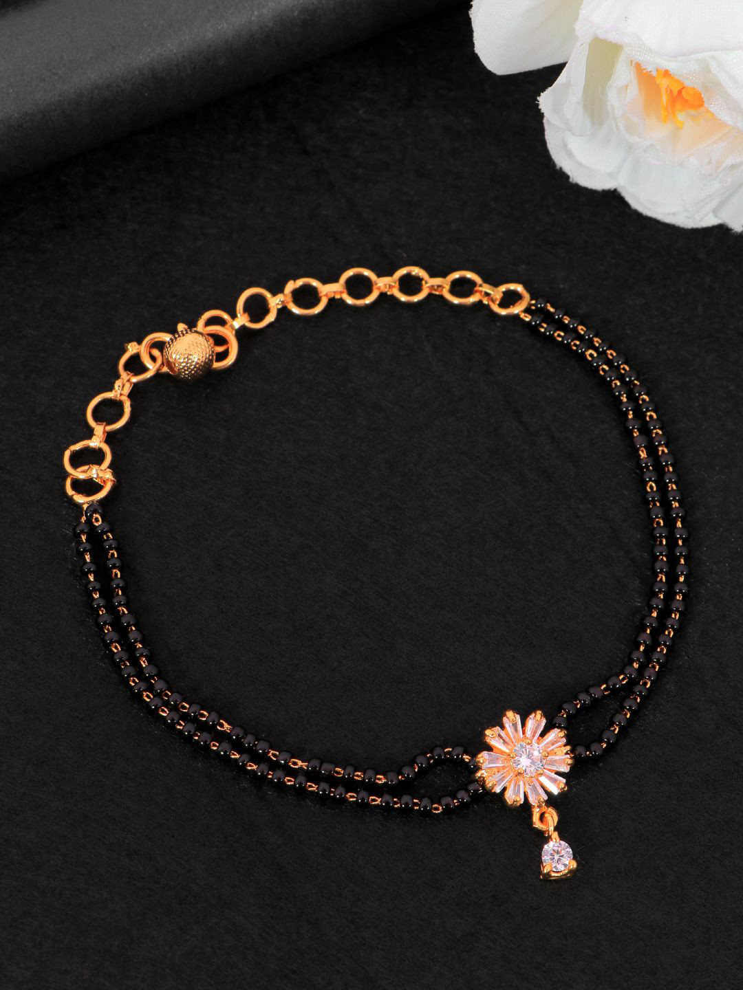 

SwaDev Women Gold-Plated Gold-Toned & Black American Diamond Enamelled Link Bracelet