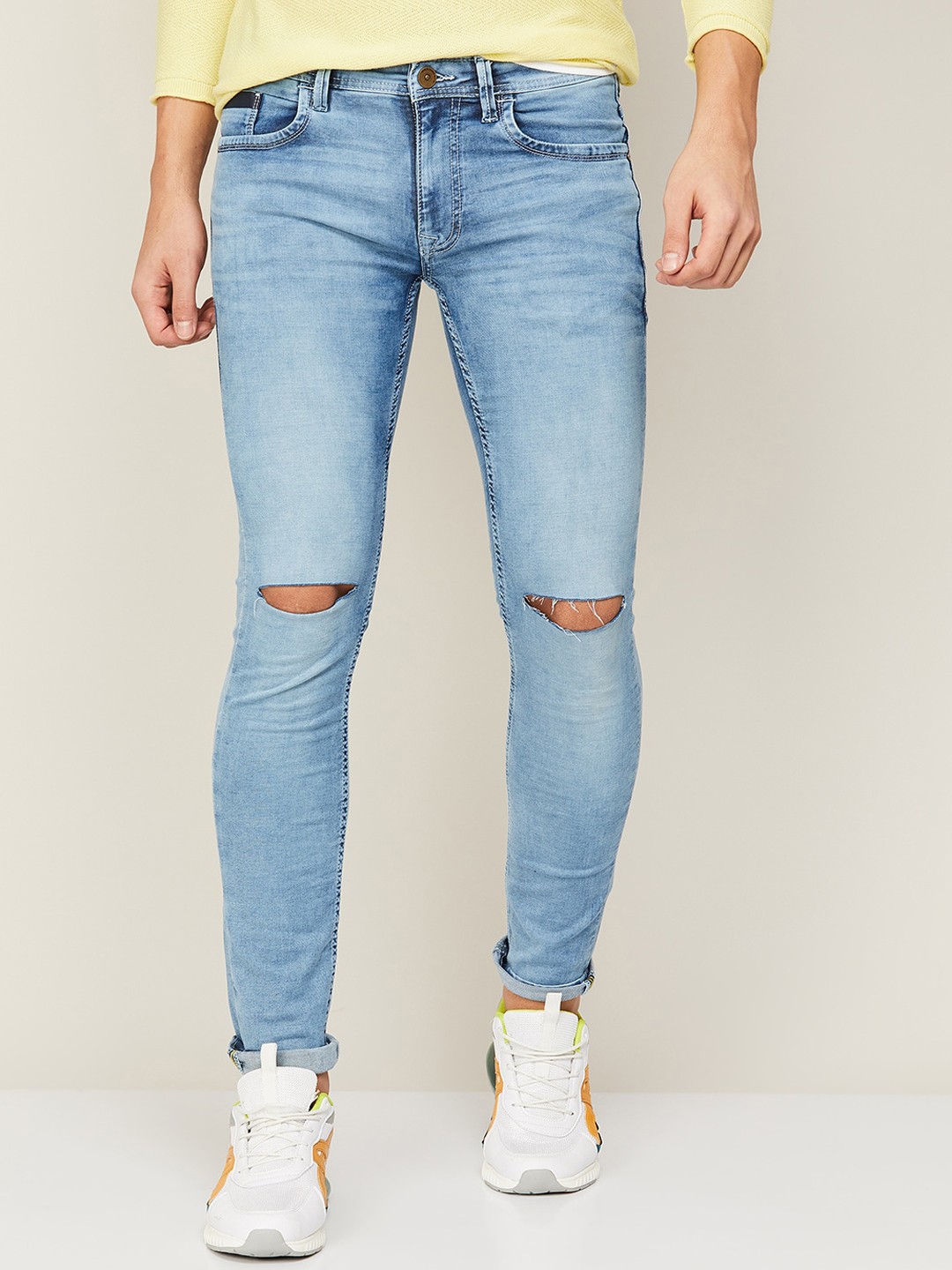 

Forca Men Blue Skinny Fit Slash Knee Light Fade Stretchable Cotton Jeans
