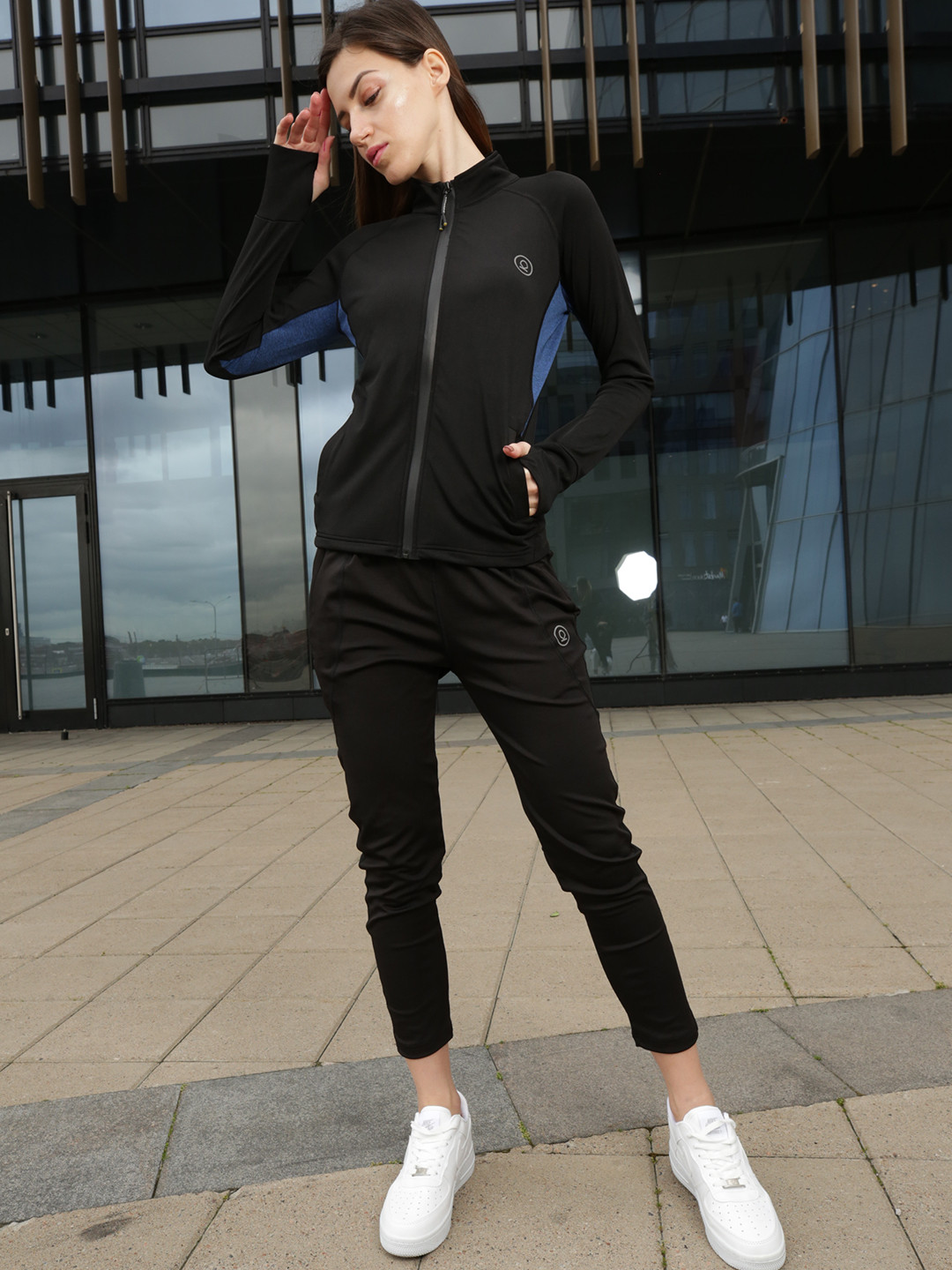 

CHKOKKO Women Black & Royal Blue Solid Tracksuits