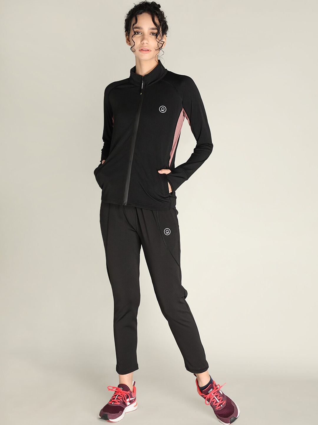 

CHKOKKO Women Black Solid Sports Tracksuit