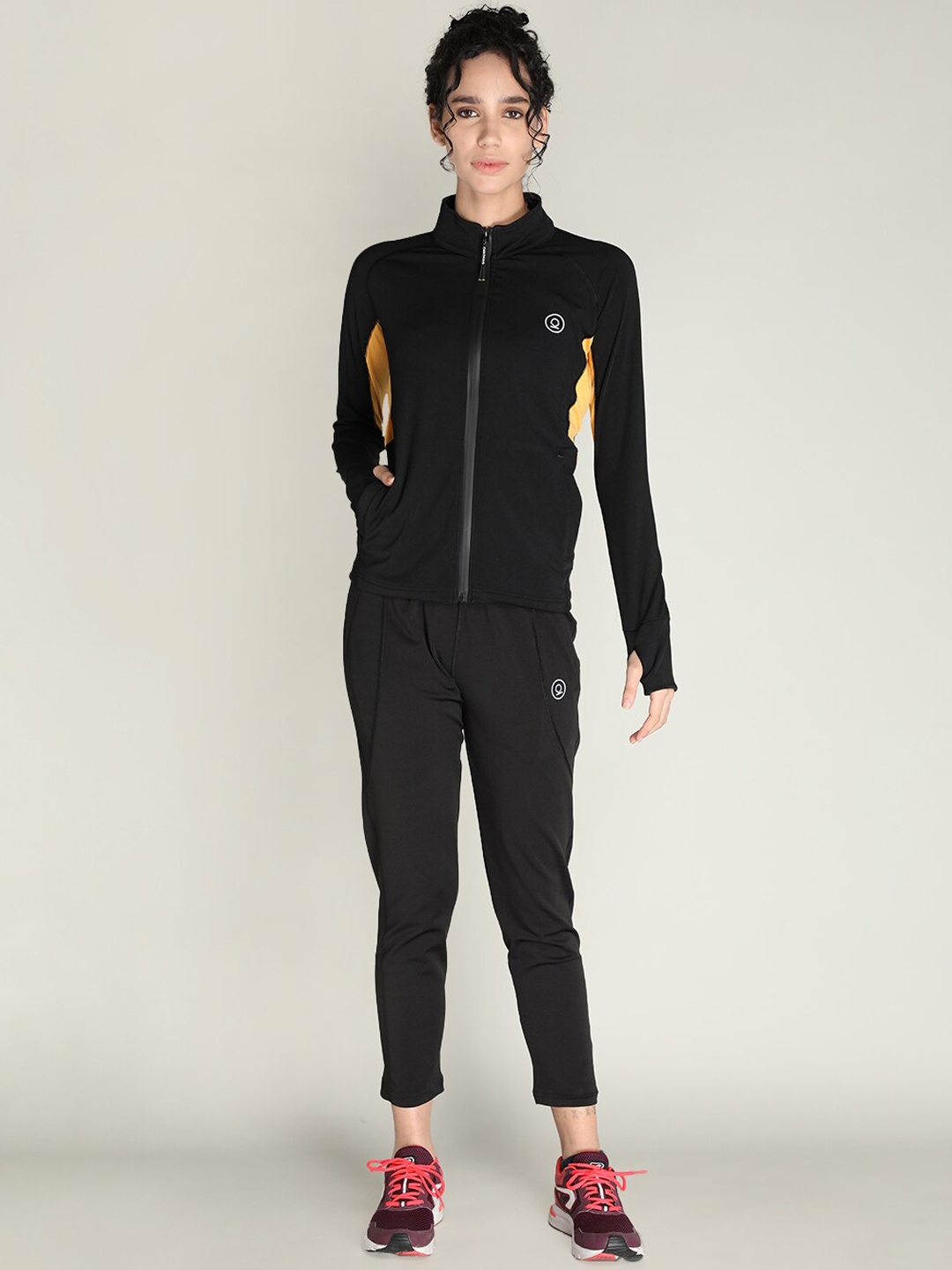 

CHKOKKO Women Black Solid Gym & workout Tracksuits