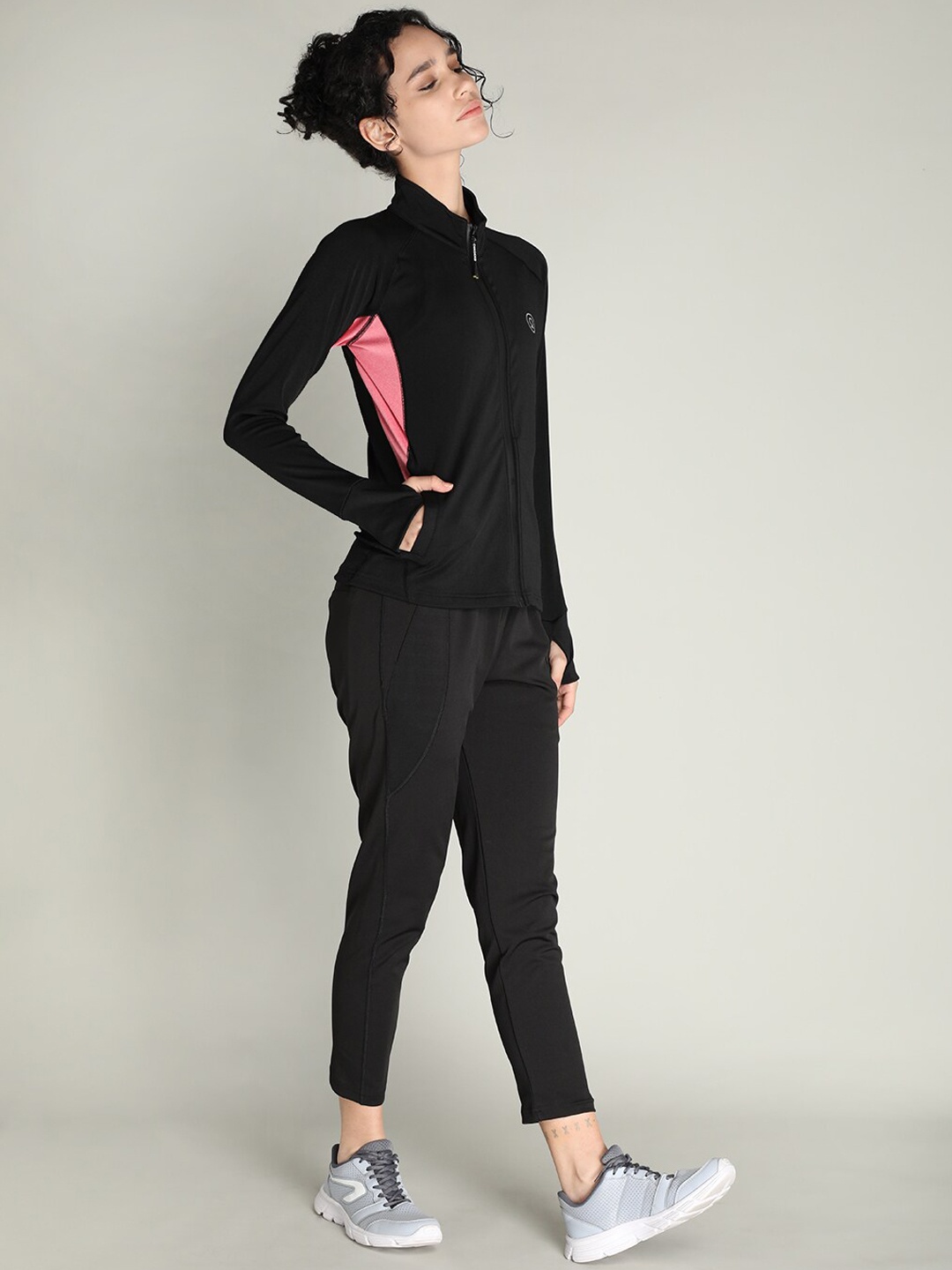

CHKOKKO Women Black & Pink Solid Tracksuits