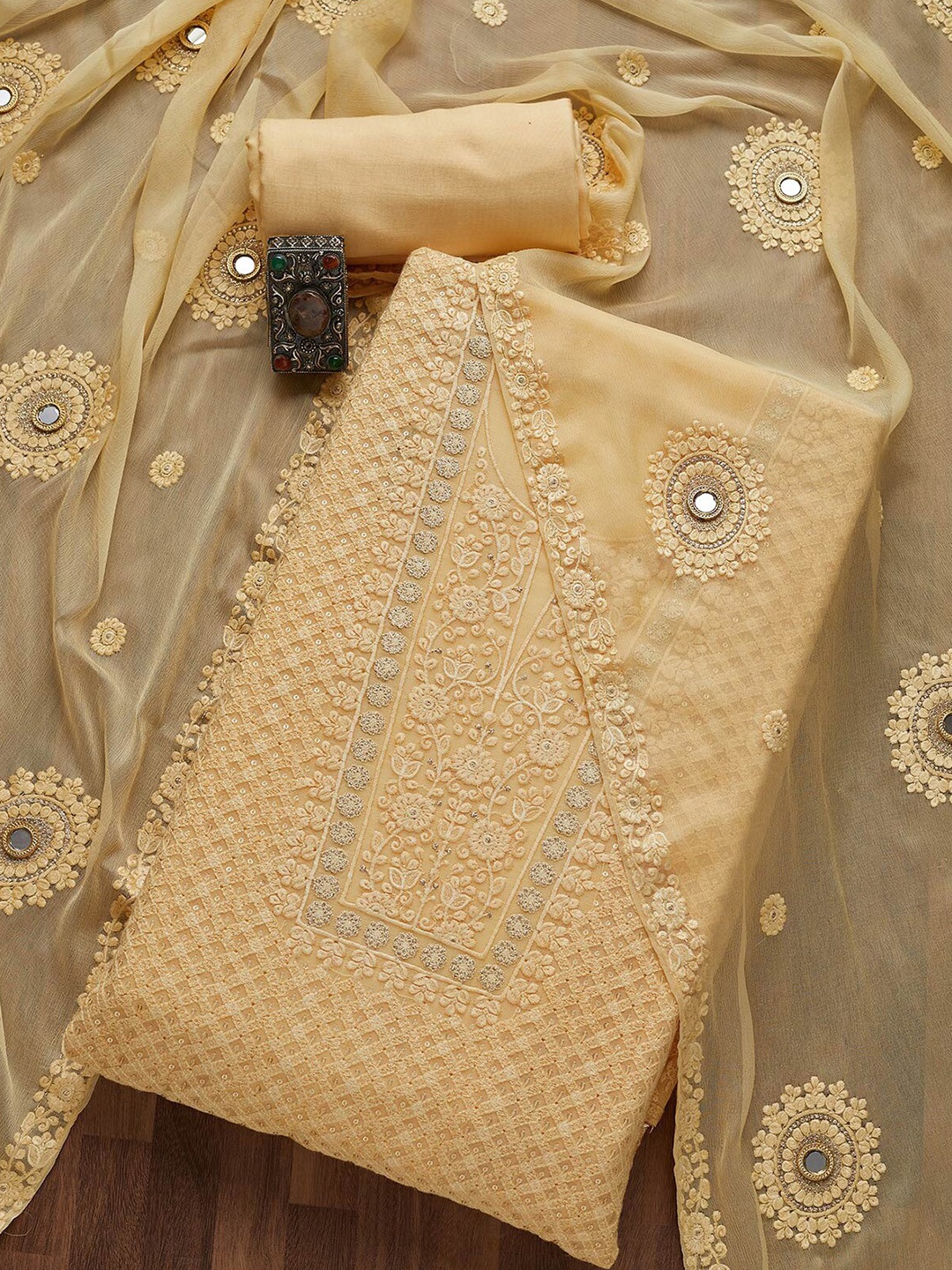 

Koskii Beige Embroidered Unstitched Dress Material