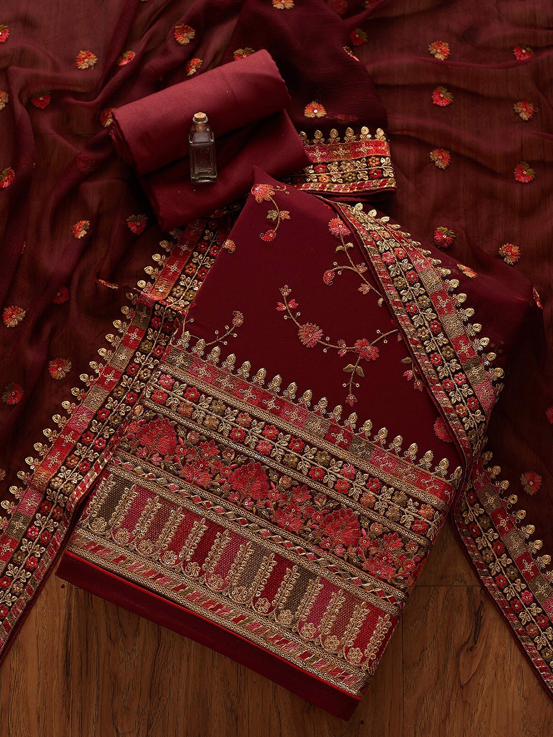 

Koskii Women Maroon & Red Embroidered Unstitched Dress Material