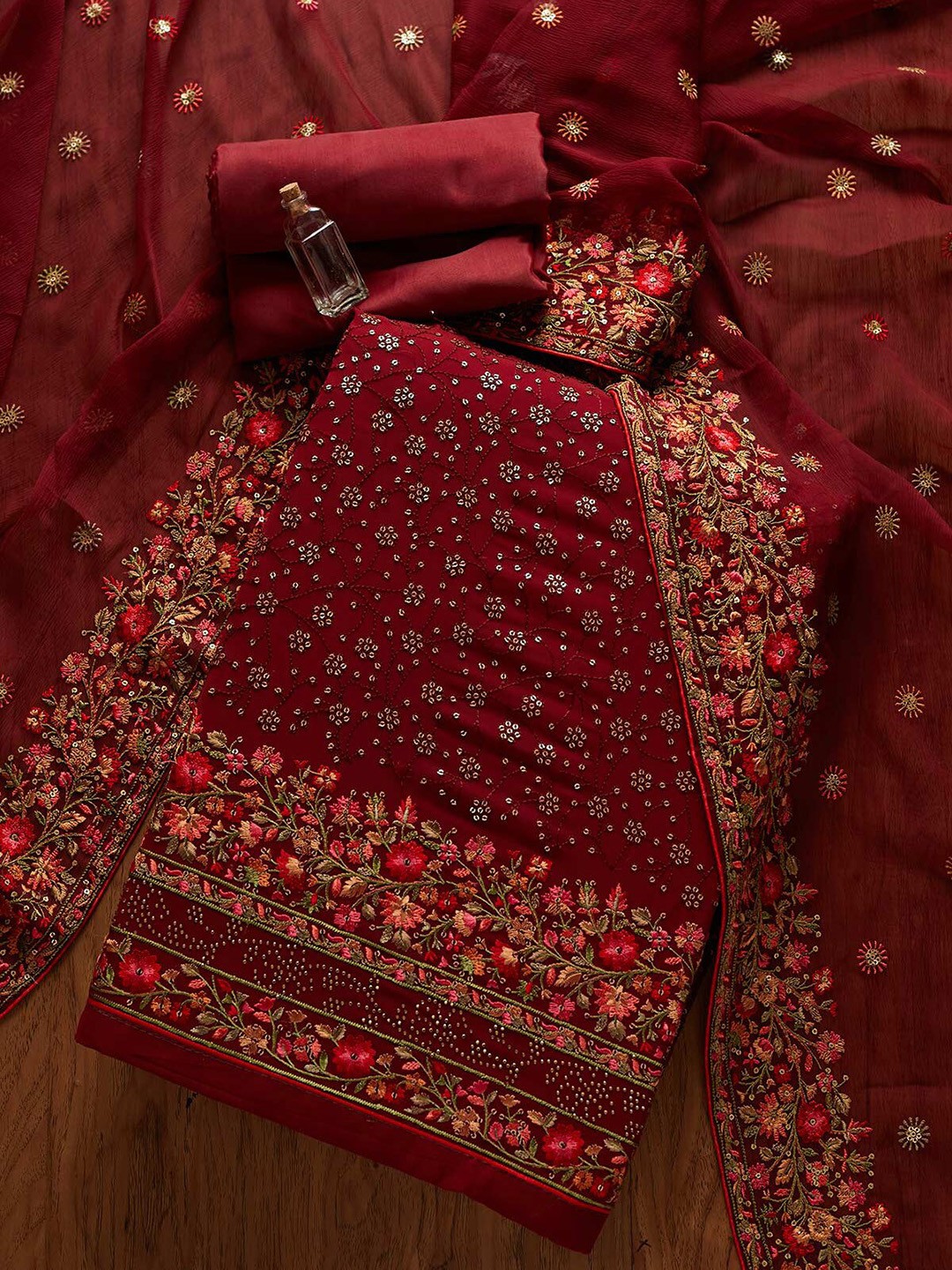 

Koskii Maroon & Red Embroidered Unstitched Dress Material