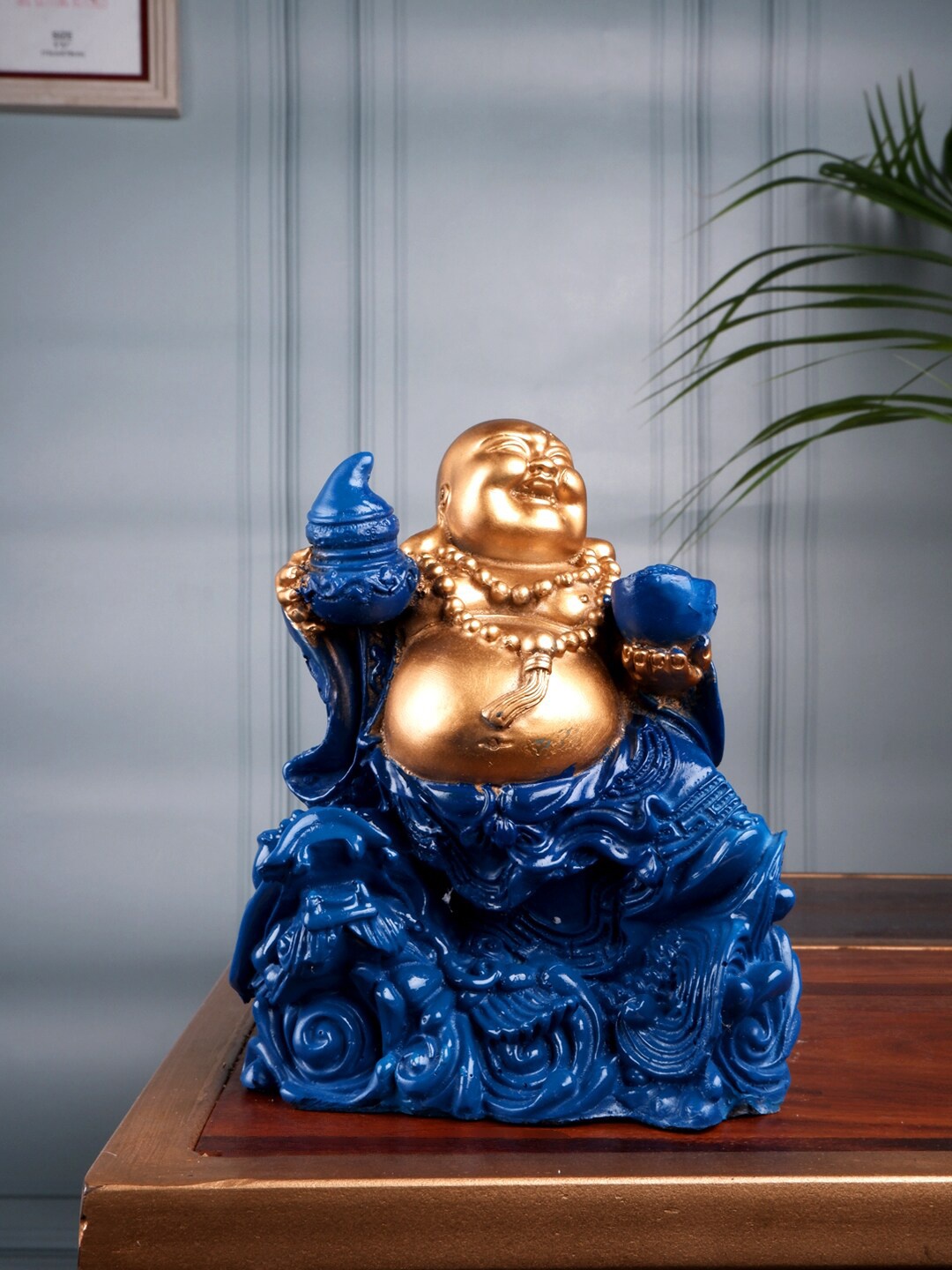 

THE WHITE INK DECOR Gold-Toned & Blue Textured Laughing Buddha Showpiece