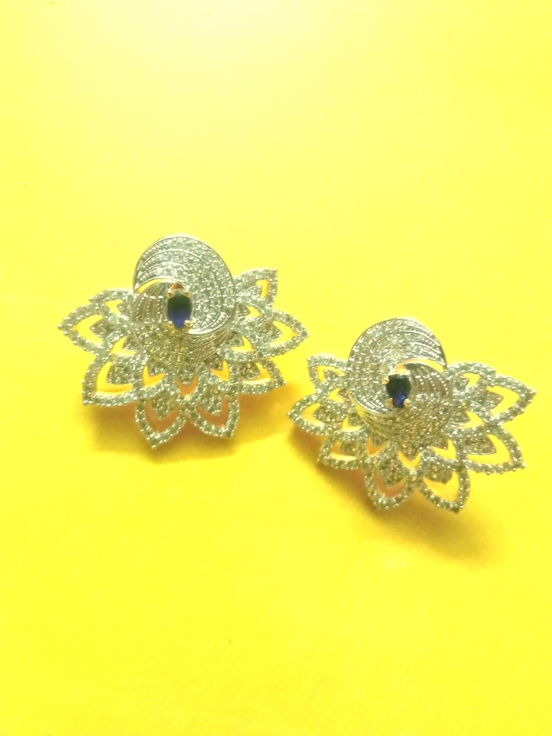 

Runjhun Silver-Toned Contemporary Studs Earrings