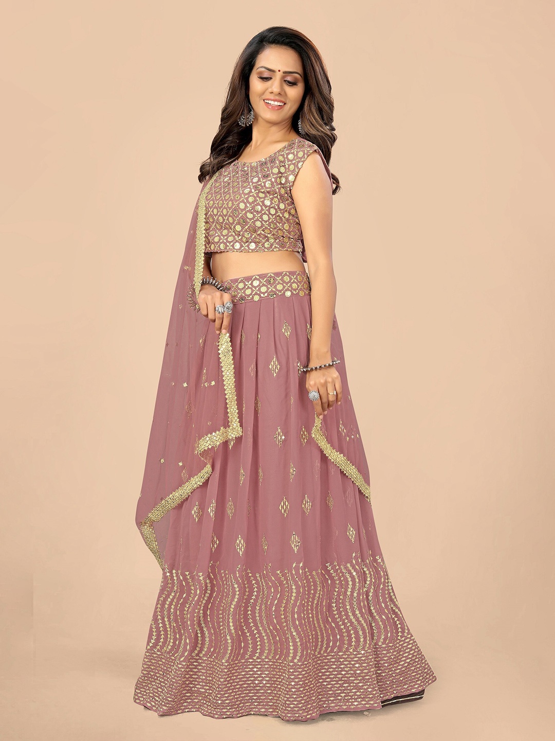 

Nityanta Fab Peach-Coloured & Gold-Toned Embroidered Patchwork Semi-Stitched Lehenga & Unstitched Blouse