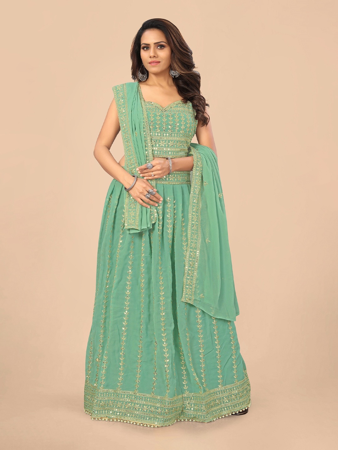 

Nityanta Fab Turquoise Blue & Gold-Toned Embroidered Patchwork Semi-Stitched Lehenga & Unstitched Blouse