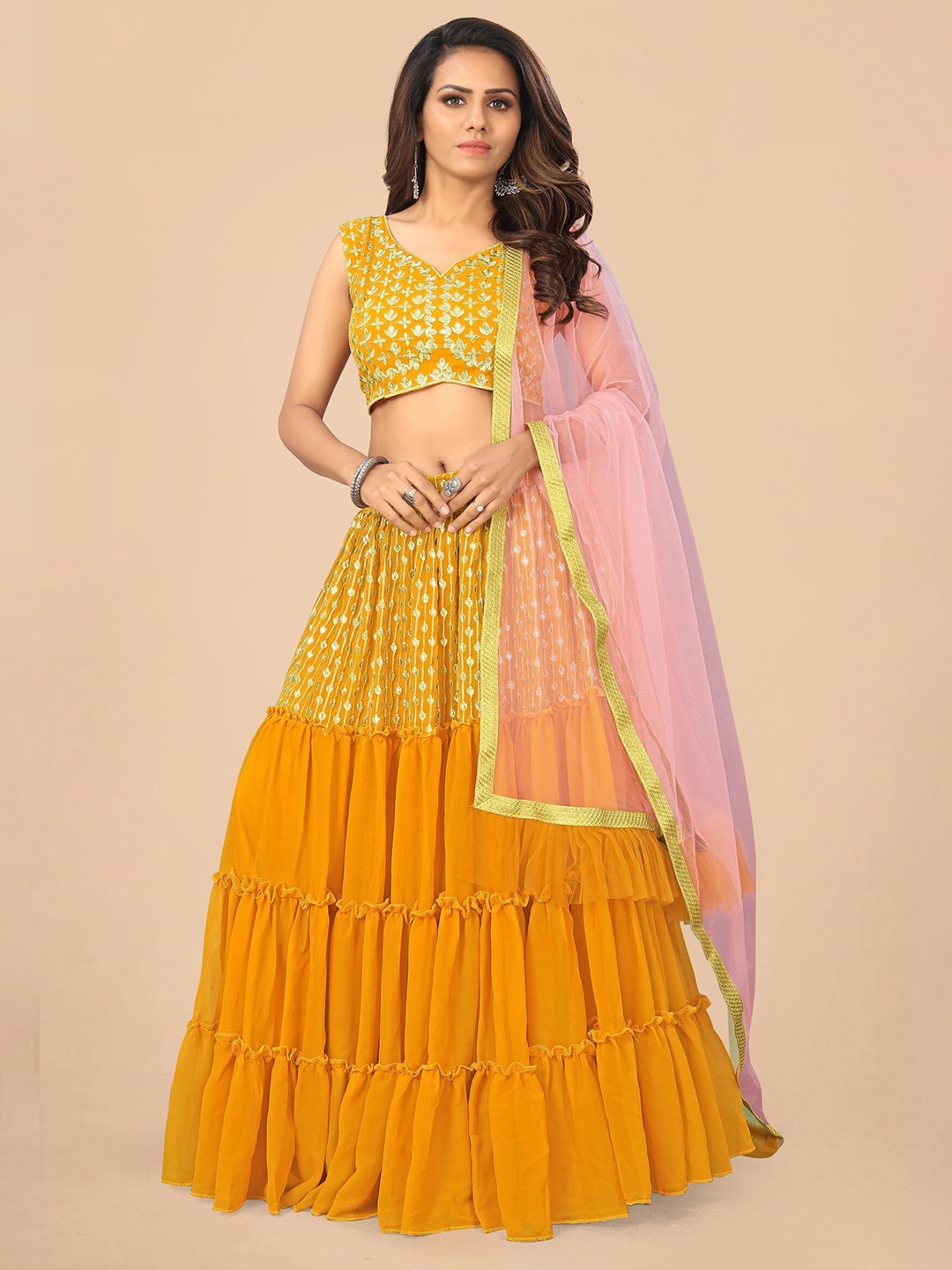 

Nityanta Fab Yellow & Gold-Toned Semi-Stitched Lehenga & Unstitched Blouse With Dupatta