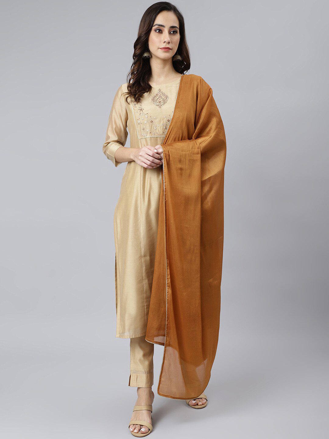 

Janasya Women Beige Chanderi Silk Solid Kurta with Trousers and Dupatta