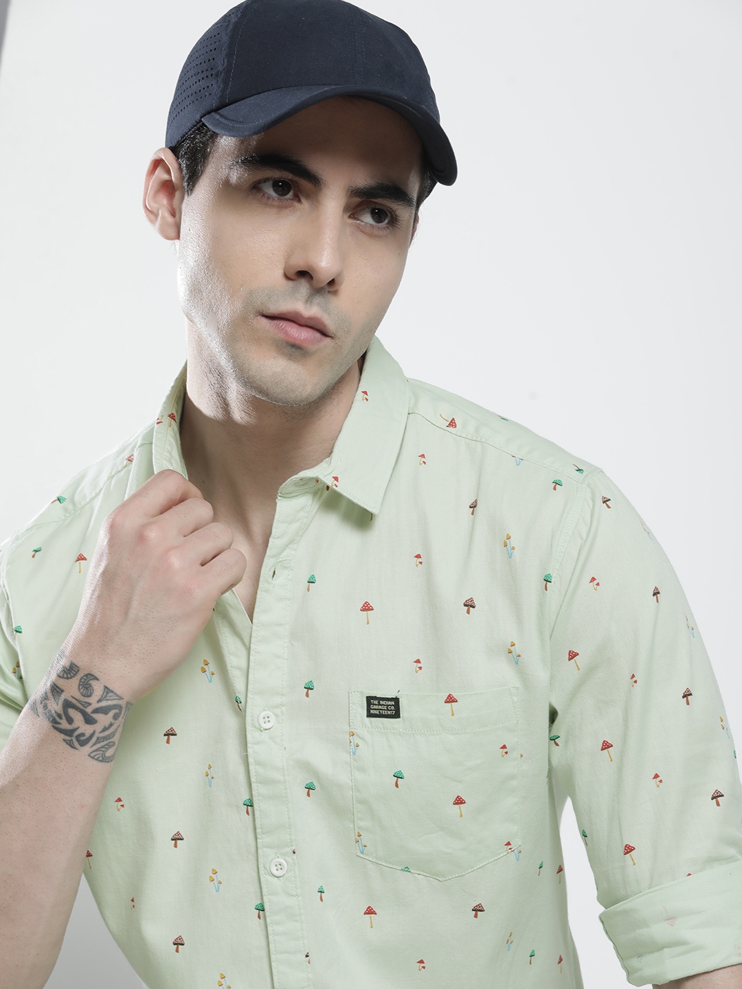 

The Indian Garage Co Men Green Conversational Printed Casual Shirt