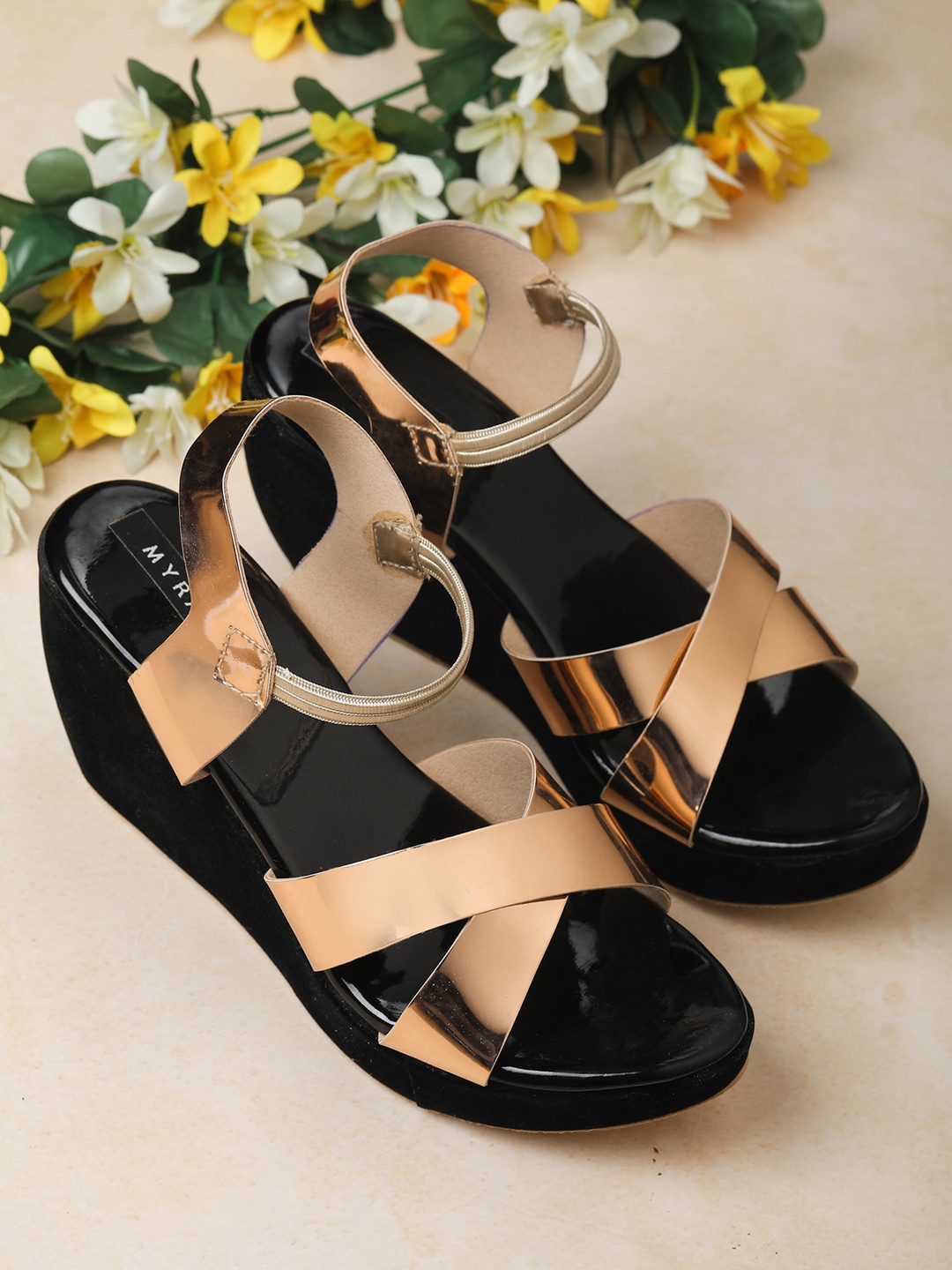 

Myra Gold-Toned Wedge Heels with Buckles