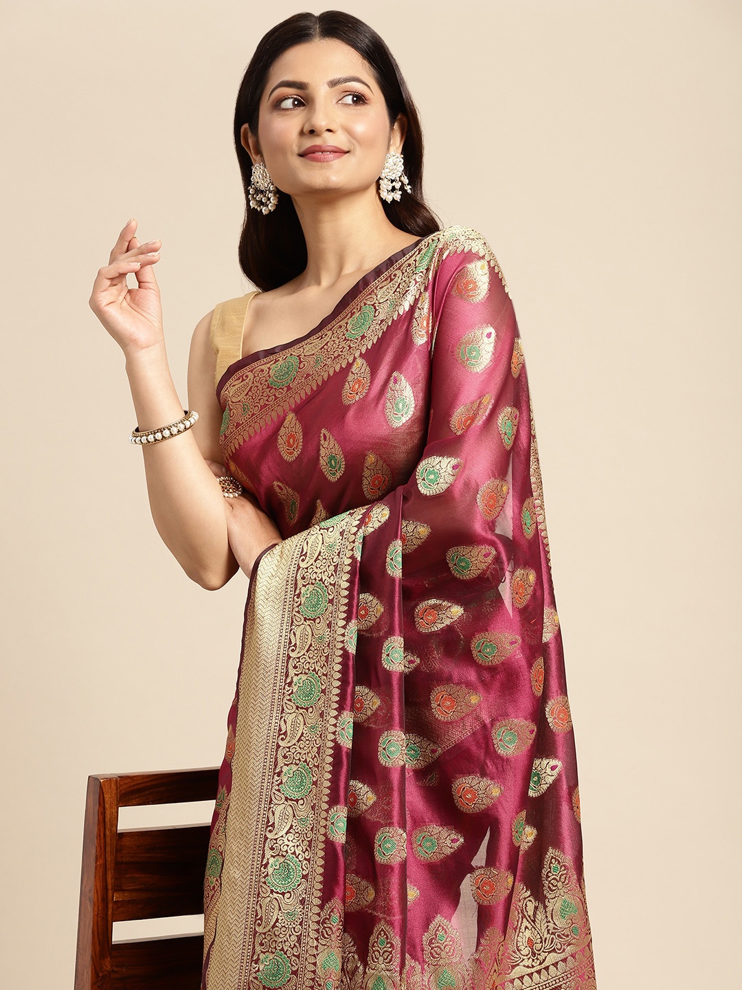 

Mitera Maroon & Golden Woven Design Zari Organza Kanjeevaram Saree