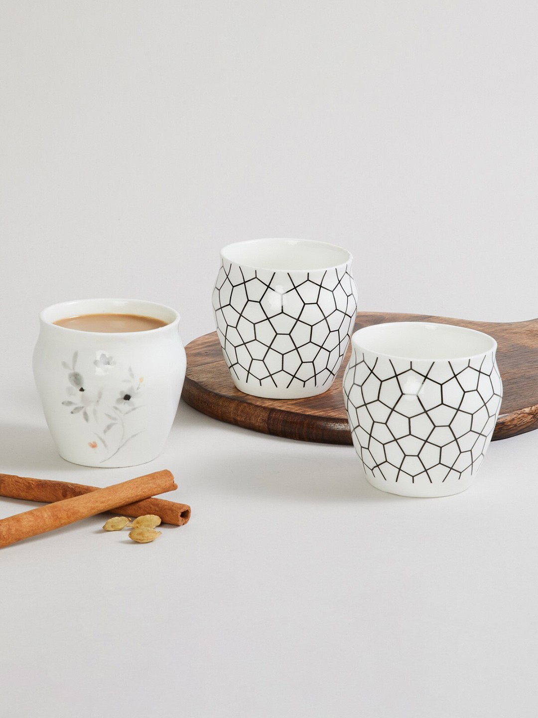 

Home Centre Pack of 3 White & Black Dishware safe Bone China Glossy Kulladhs 240ml each