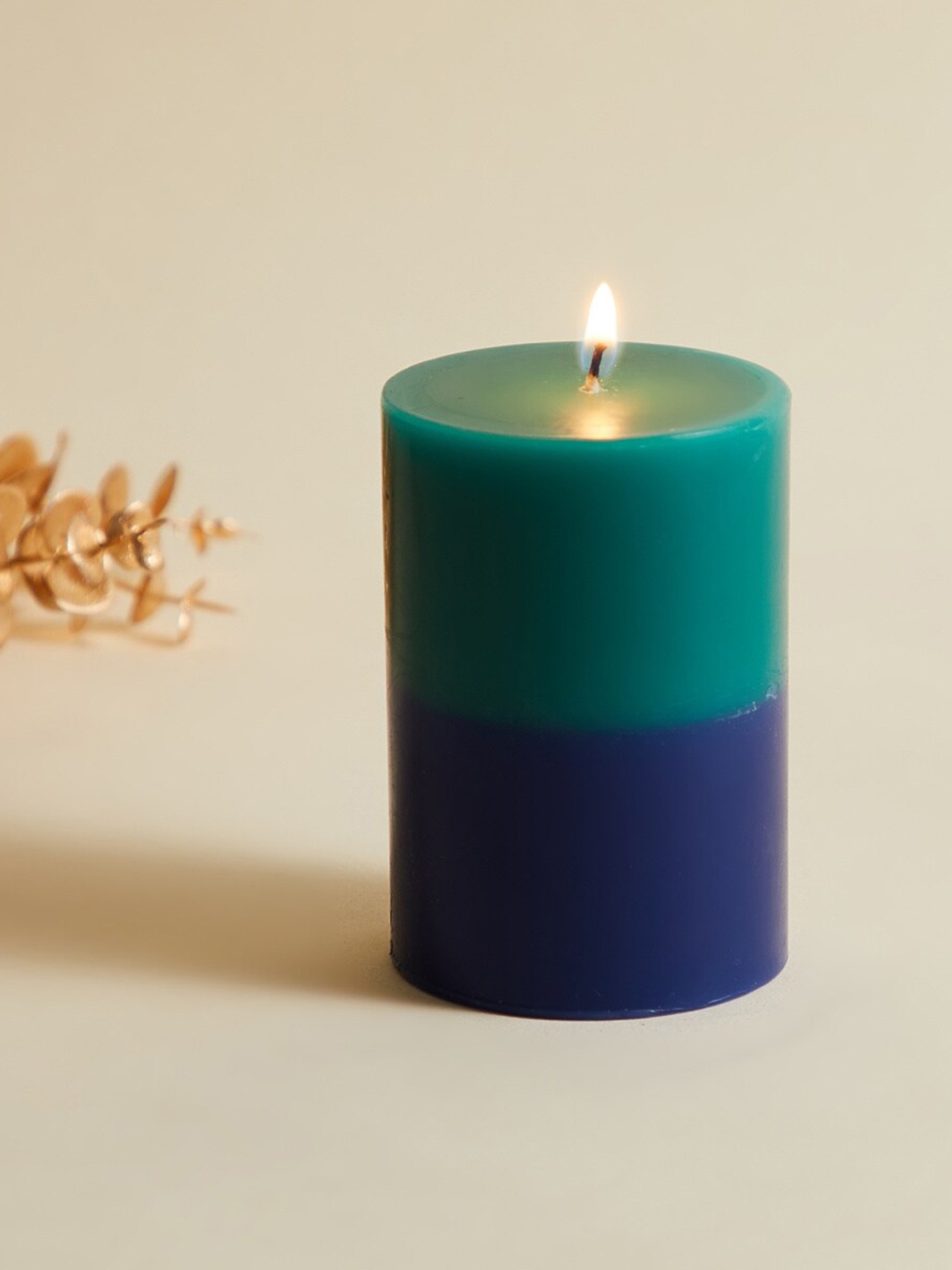 

Home Centre Blue Colourblocked Wax Pillar Candle