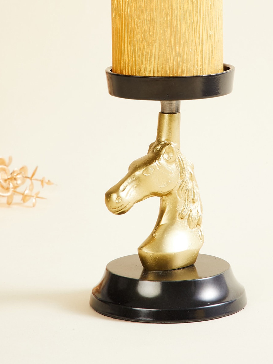 

Home Centre Gold-Toned & Black Solid Horse Aluminum Pillar Candle Holder