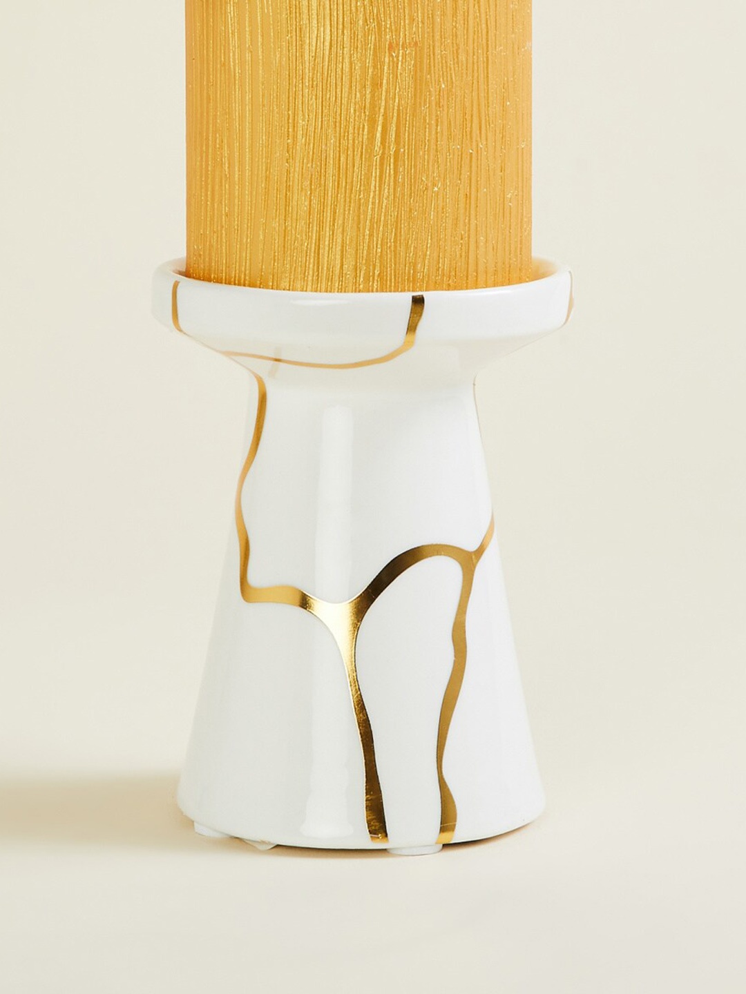 

Home Centre White & Gold-Toned Printed Round Ceramic Candle Holder